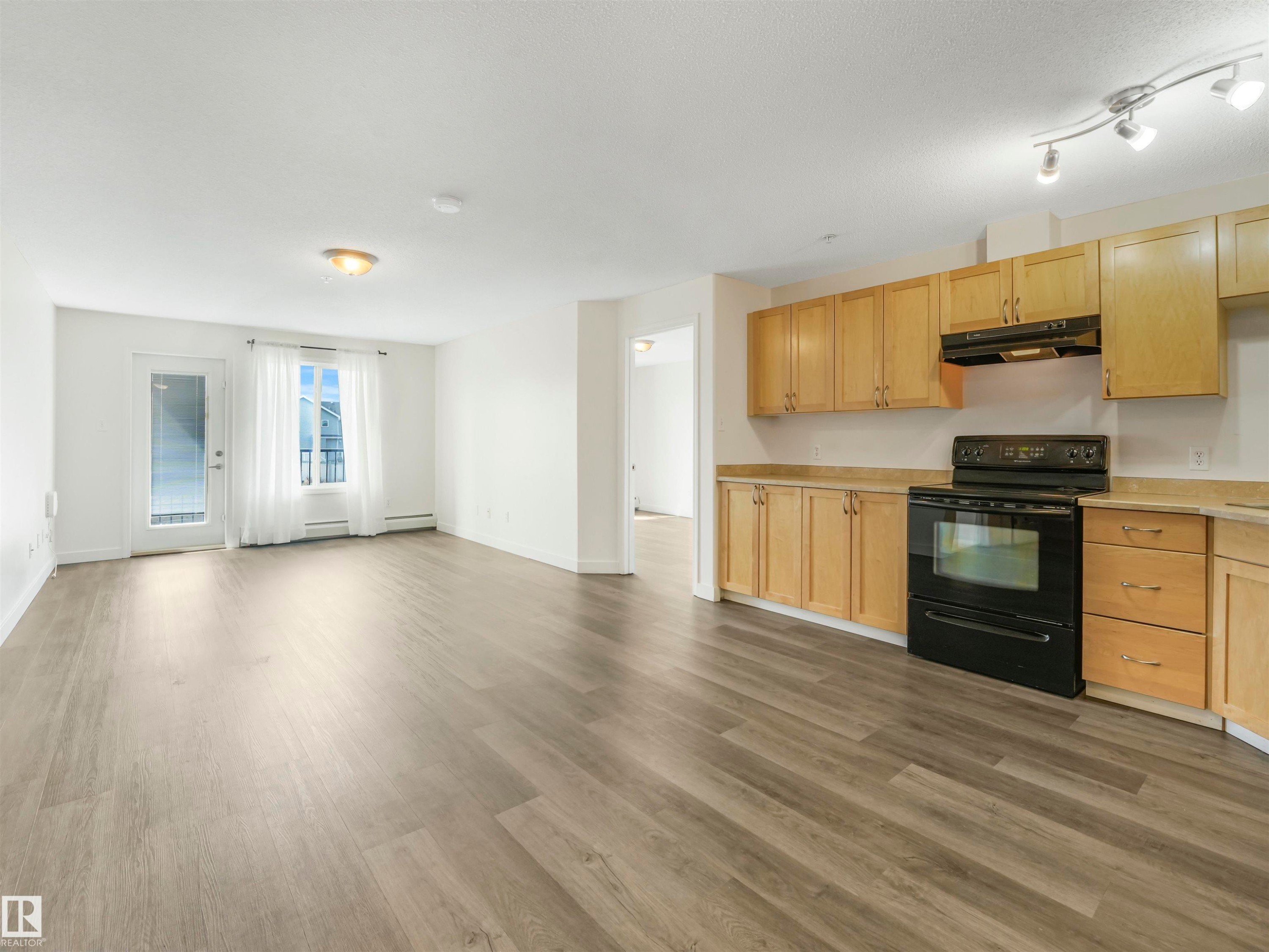 #216 111 Edwards Dr Sw, Edmonton, AB - Indoor Photo Showing Kitchen