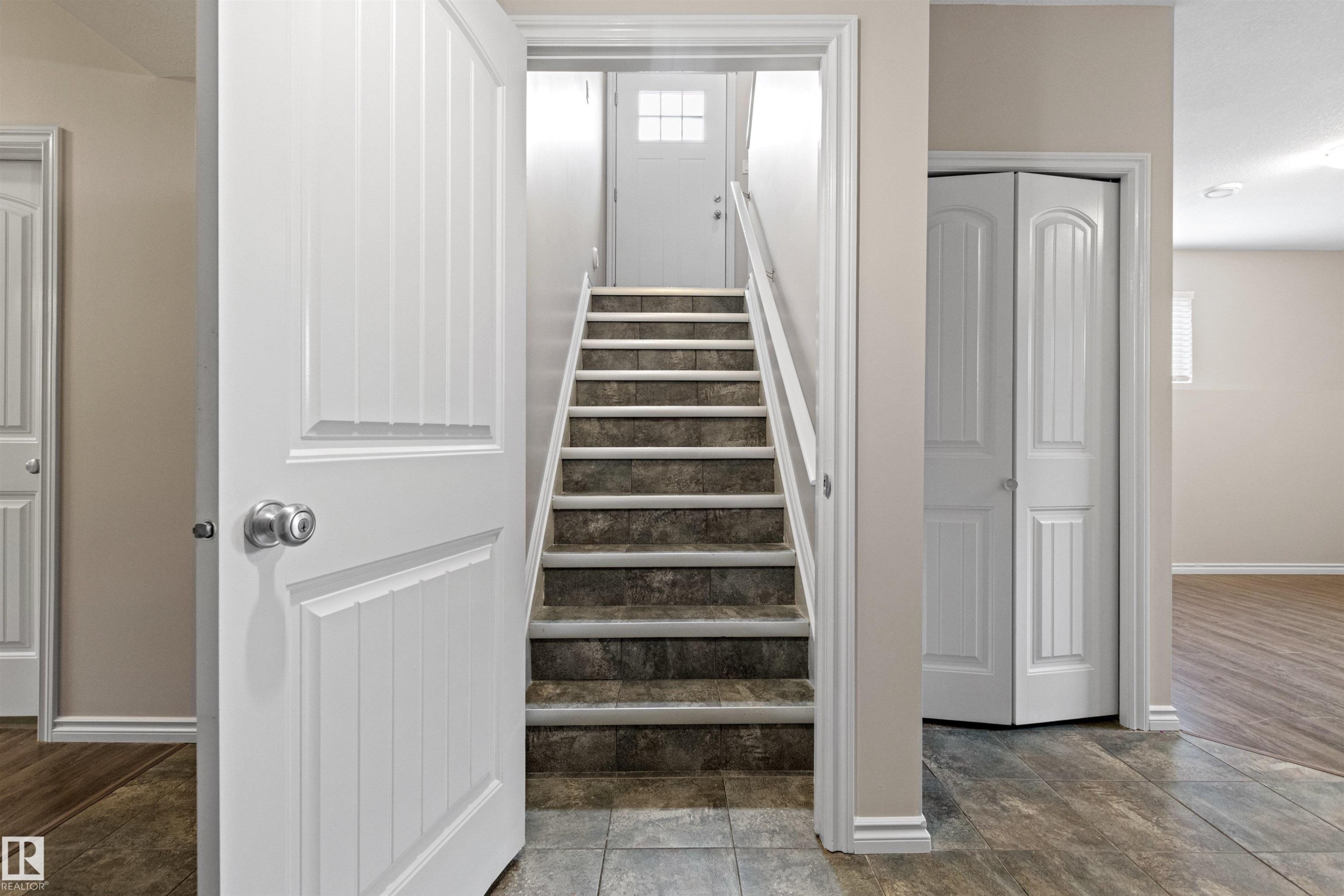 Stairwell to basement with suite potential, and second laundry area. - 10634 155 Street Nw, Edmonton, AB - Indoor Photo Showing Other Room