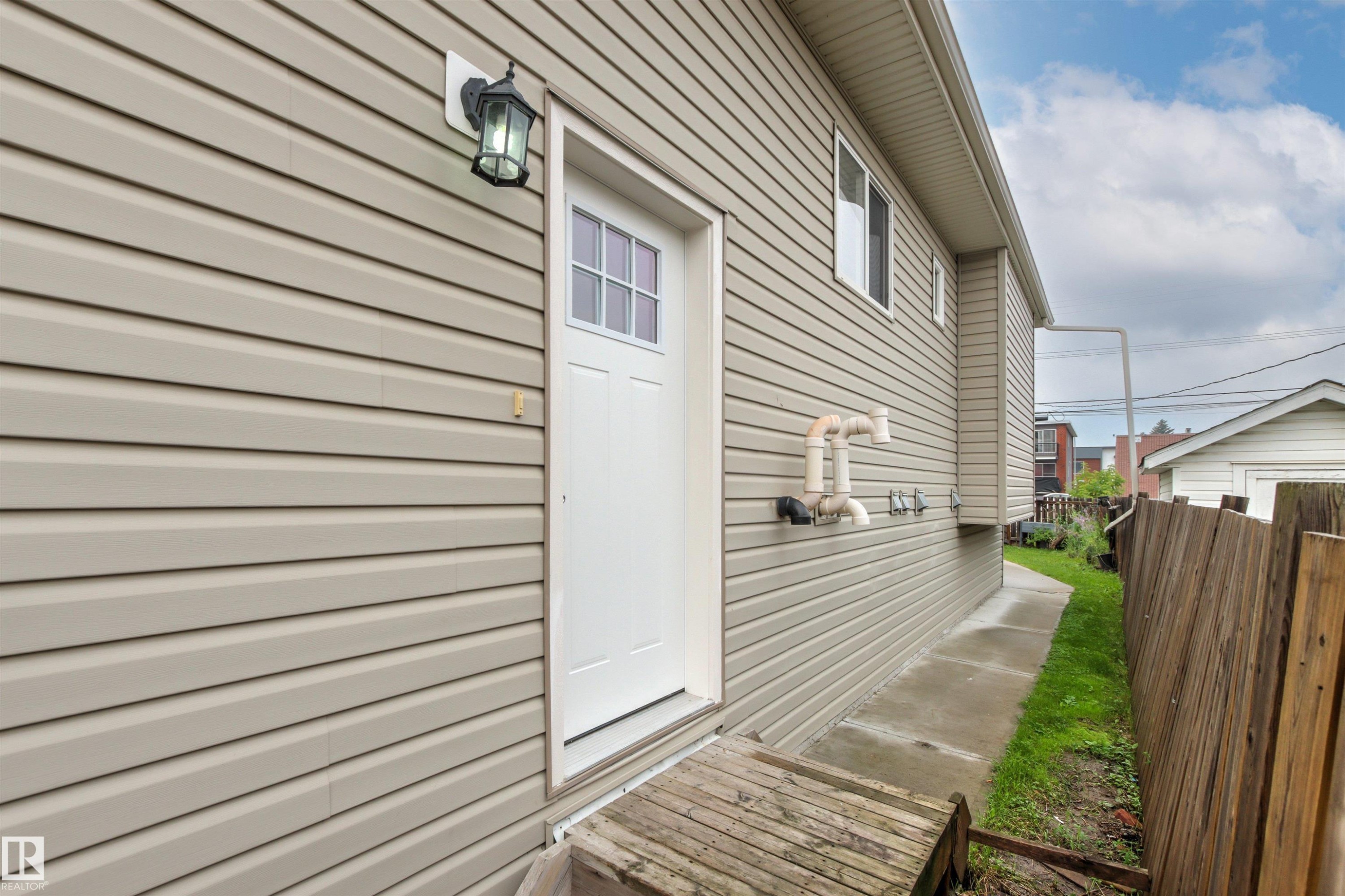 Side entrance for potential basement suite. - 10634 155 Street Nw, Edmonton, AB - Outdoor With Exterior
