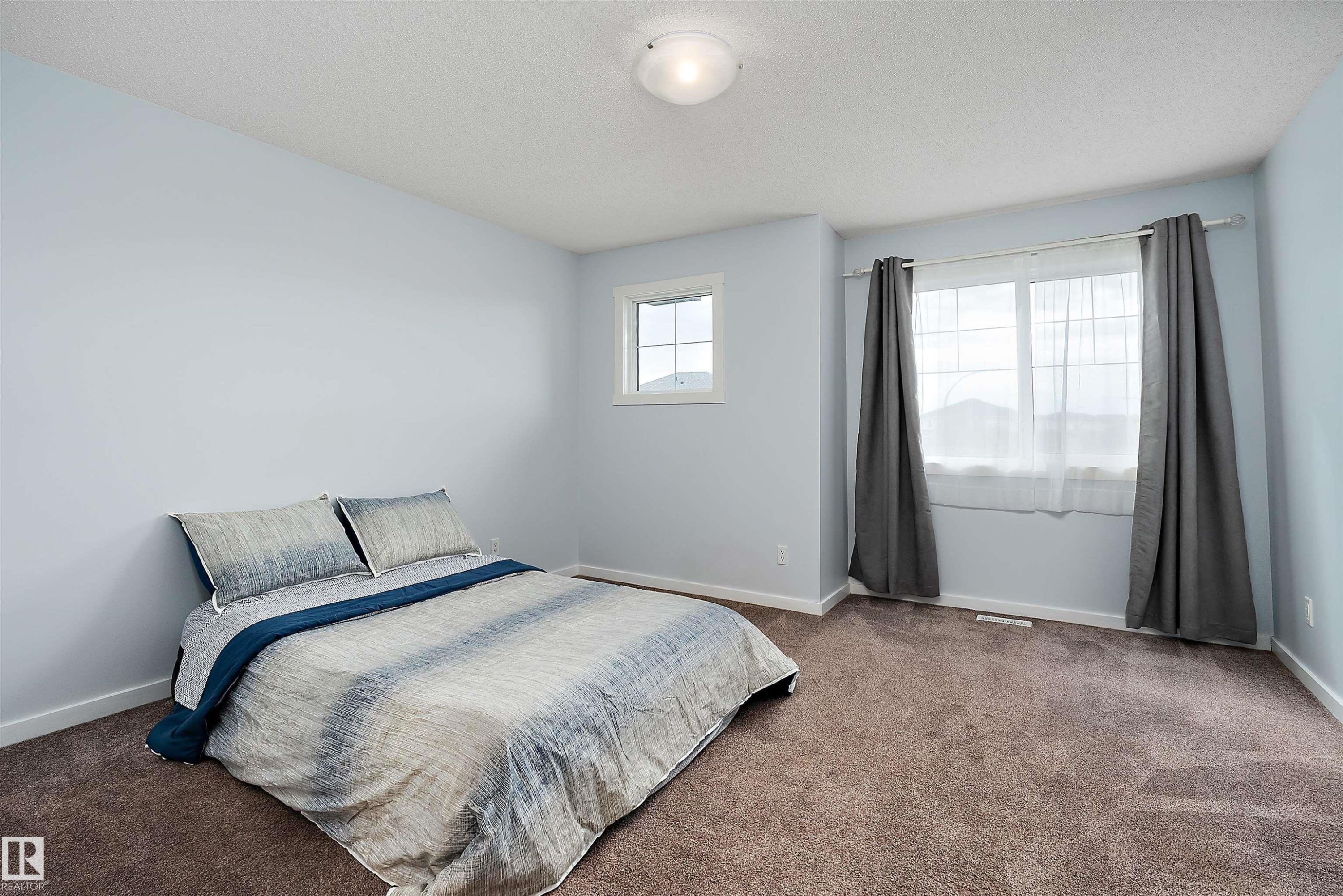 28 Rolston Close, Leduc, AB - Indoor Photo Showing Bedroom