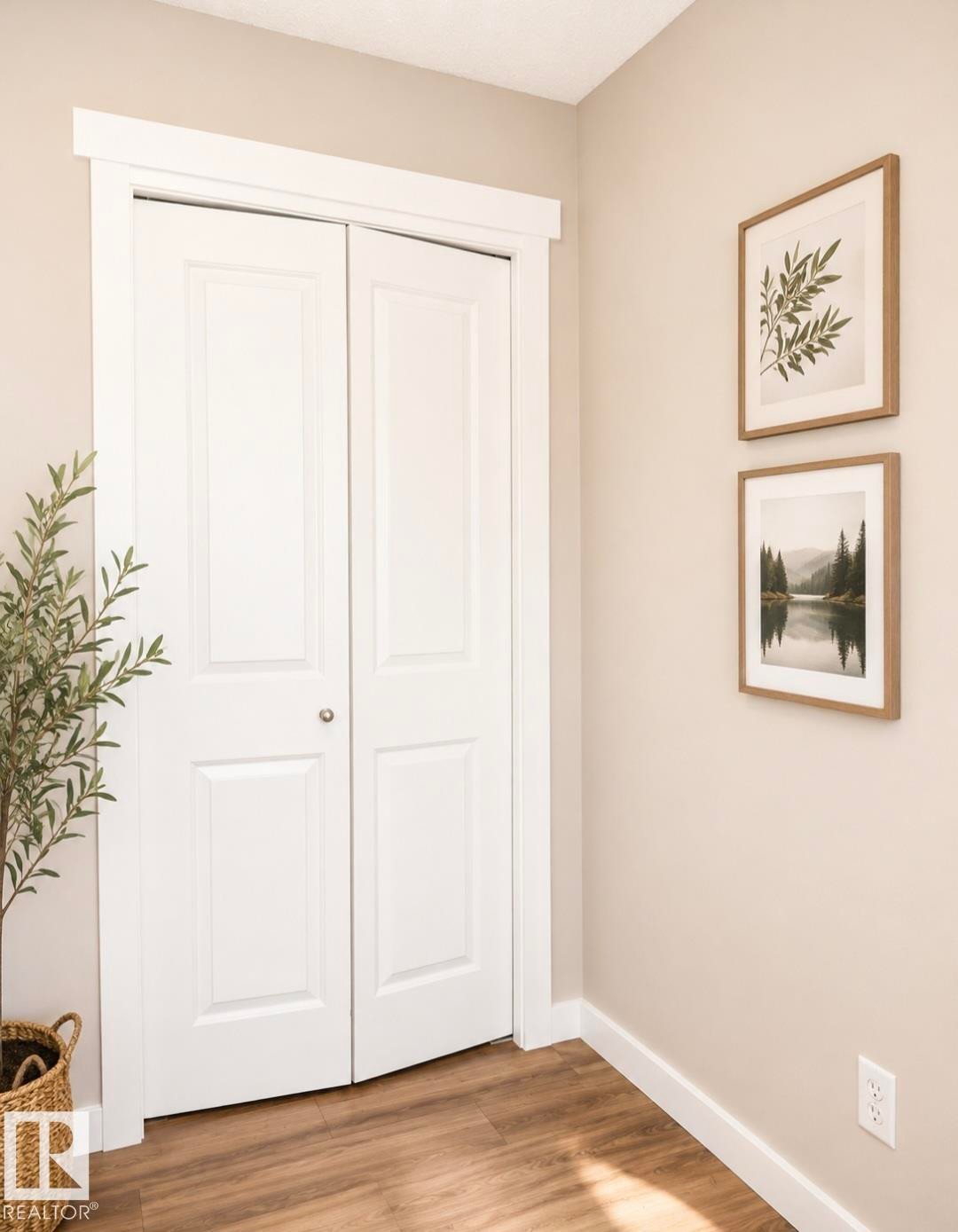 White paneled bi-fold doors with crisp white trim, set against neutral wall tones and wood-finish flooring - 5135 1A Avenue Sw, Edmonton, AB
