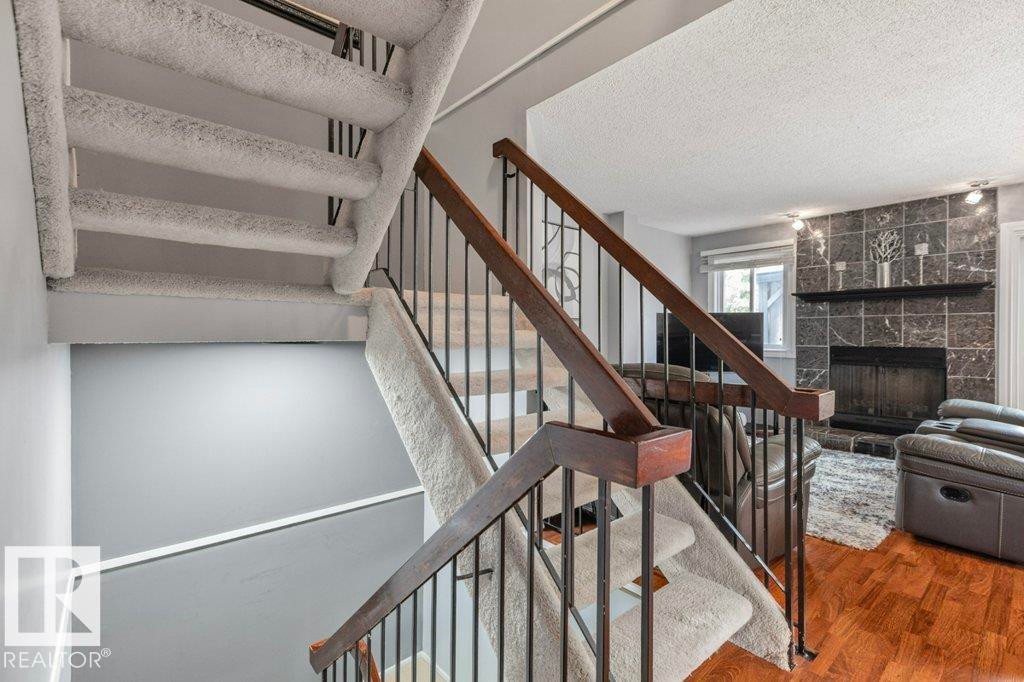 6010 173 Street Nw, Edmonton, AB - Indoor Photo Showing Other Room With Fireplace
