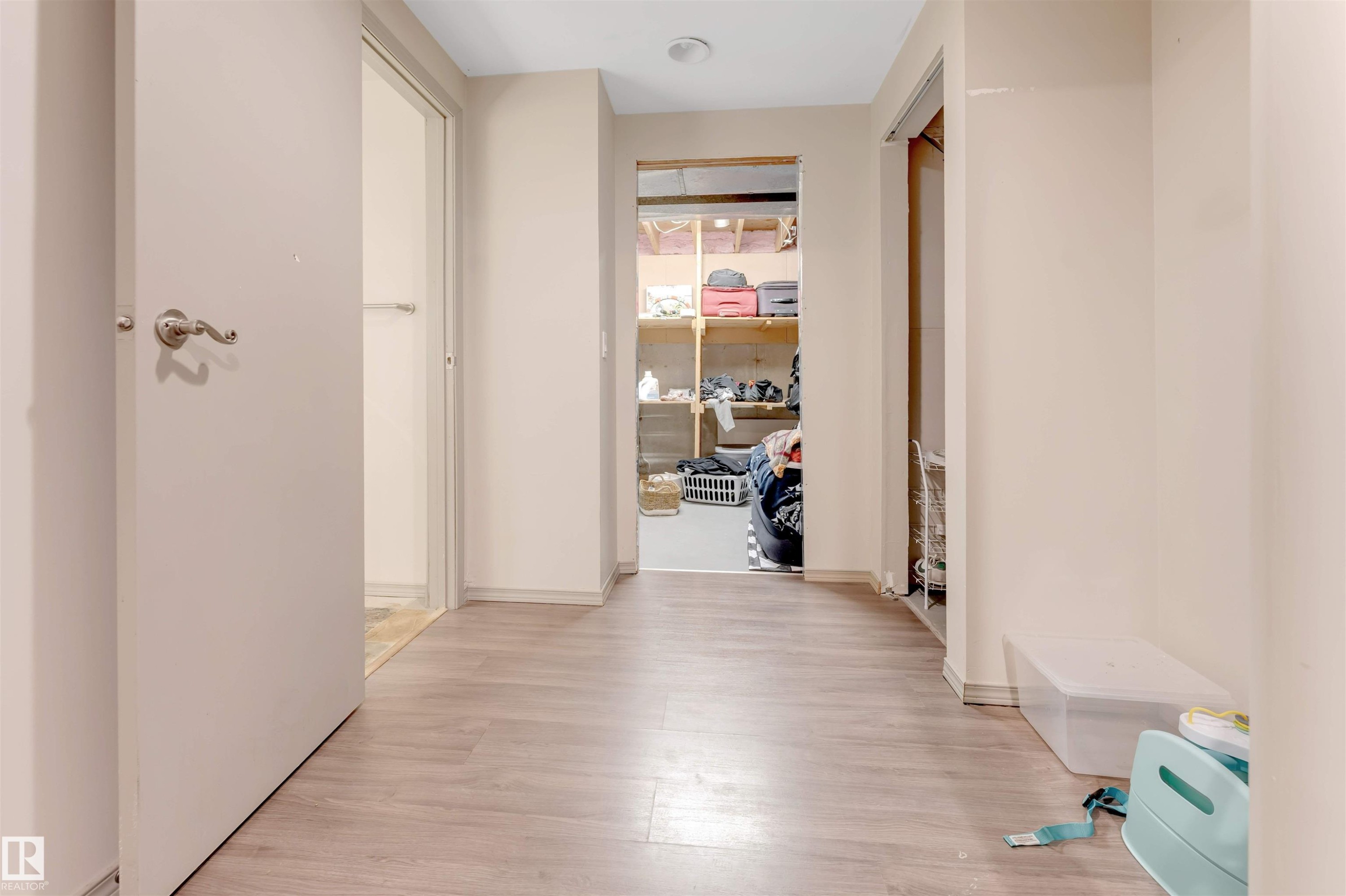 Wood-finish flooring throughout - #37 1411 Mill Woods Rd E Nw, Edmonton, AB - Indoor Photo Showing Other Room