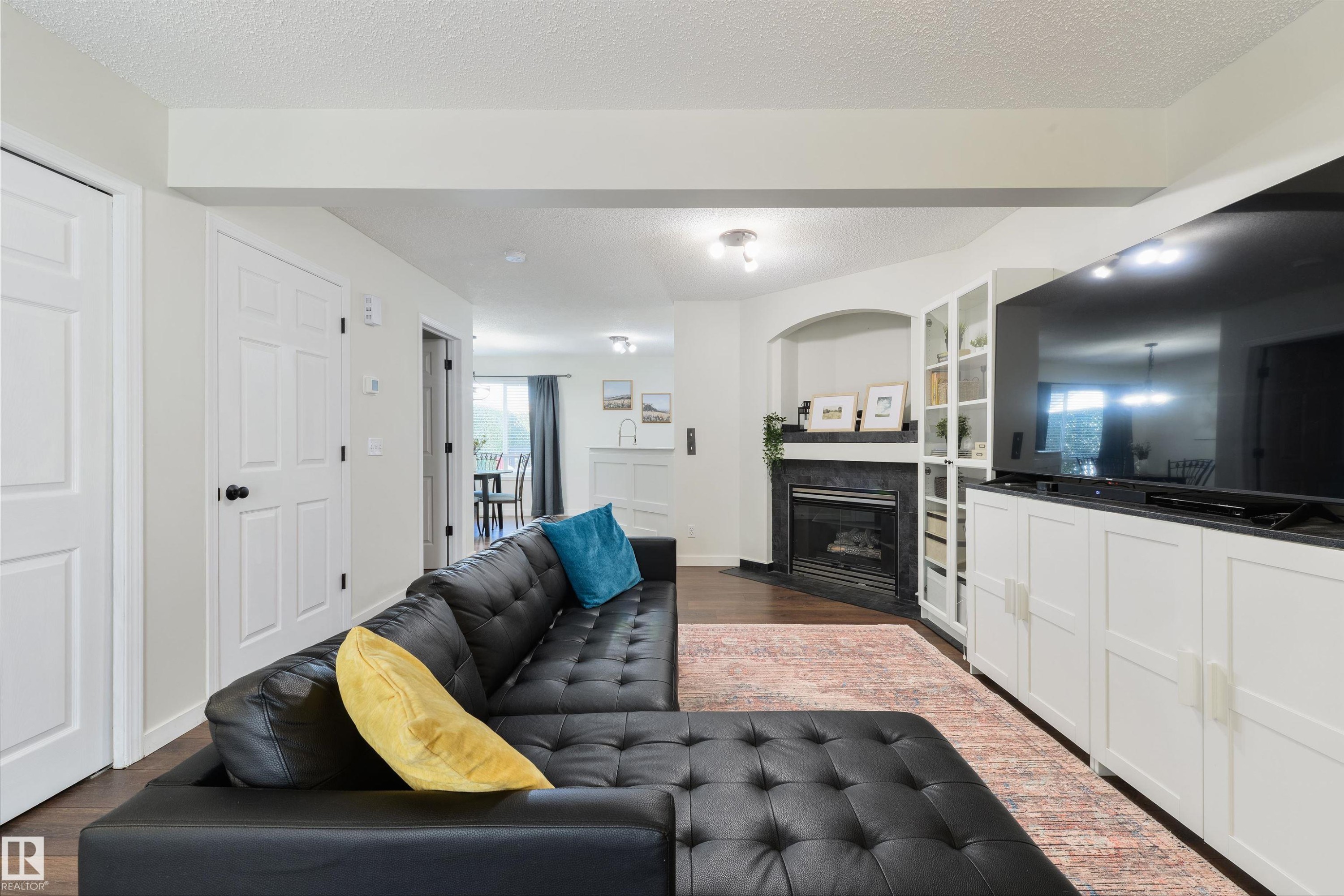 4790 Terwillegar Common Nw, Edmonton, AB - Indoor Photo Showing Living Room With Fireplace