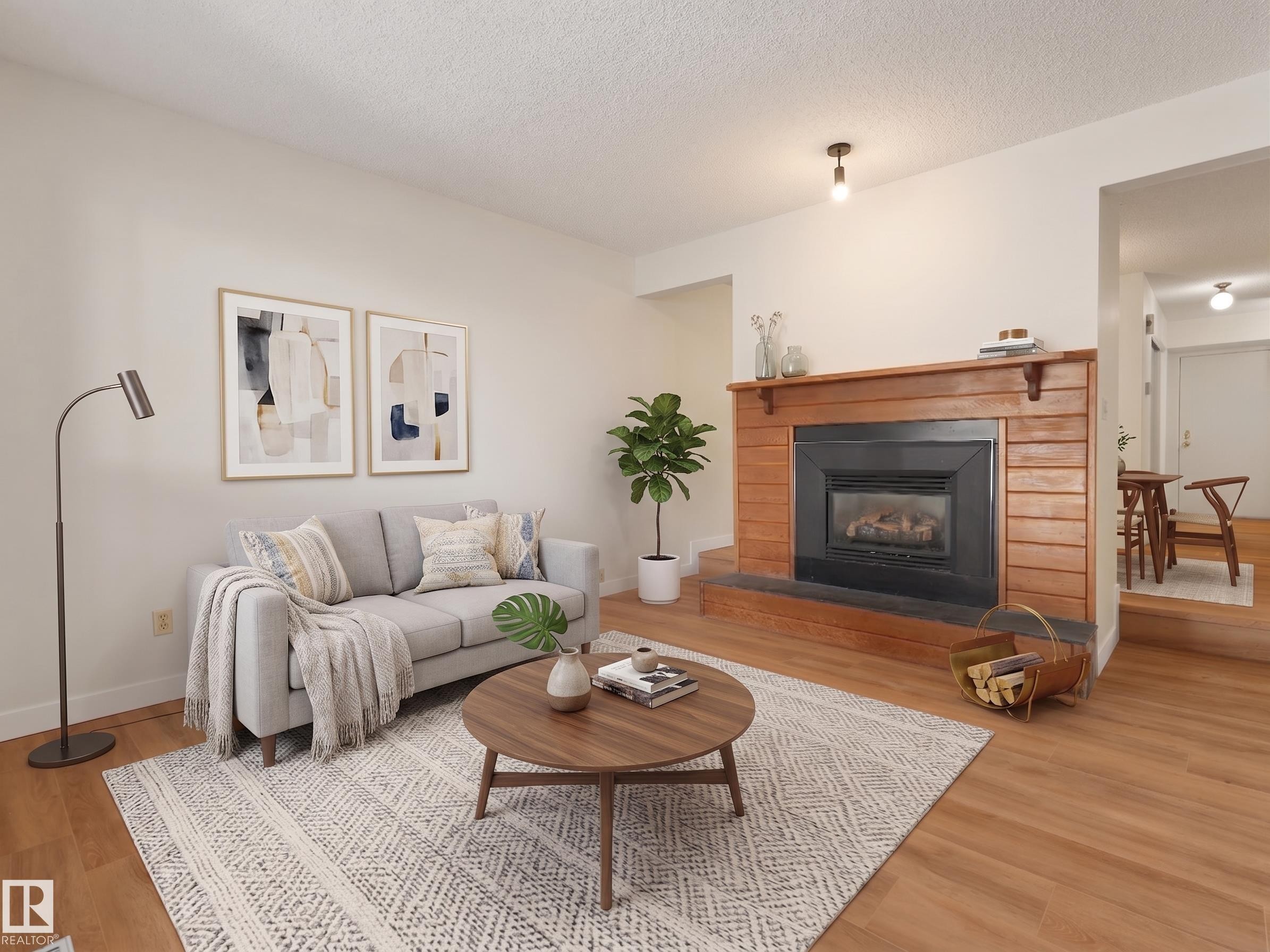 #50 1904 48 St Nw, Edmonton, AB - Indoor Photo Showing Living Room With Fireplace