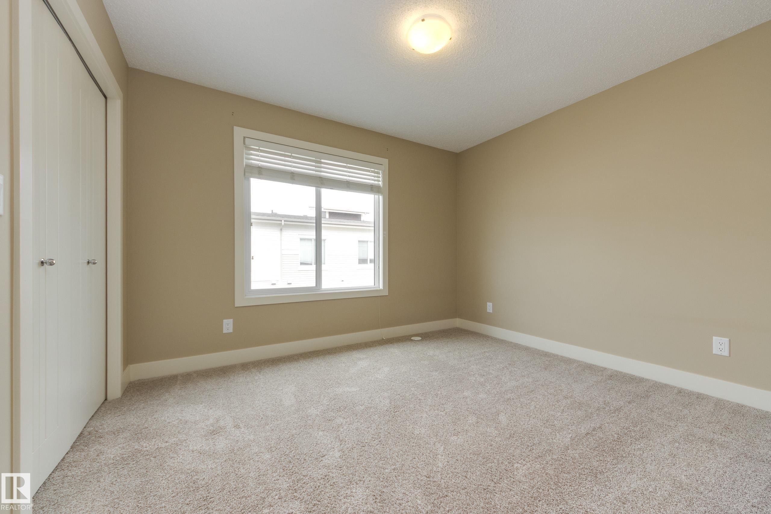 Generous sized second bedroom - #39 804 Welsh Dr Sw, Edmonton, AB - Indoor Photo Showing Other Room