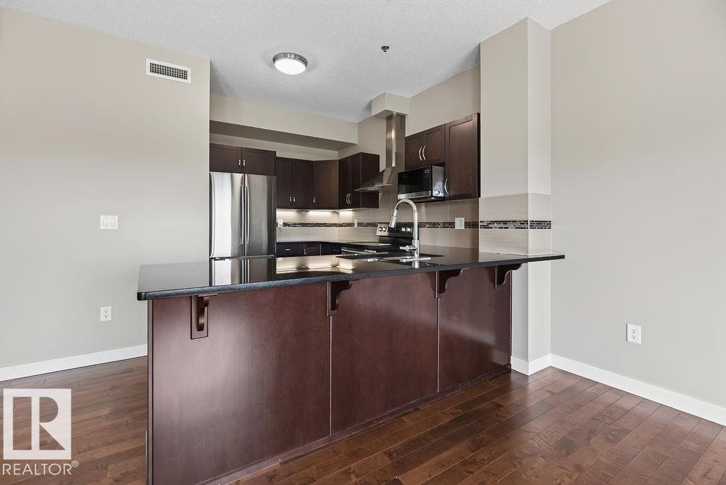#303 35 Sturgeon Rd, St. Albert, AB - Indoor Photo Showing Kitchen With Stainless Steel Kitchen With Upgraded Kitchen