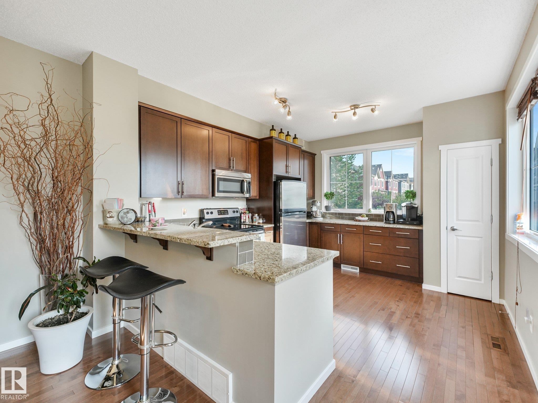#55 603 Watt Bv Sw, Edmonton, AB - Indoor Photo Showing Kitchen With Double Sink