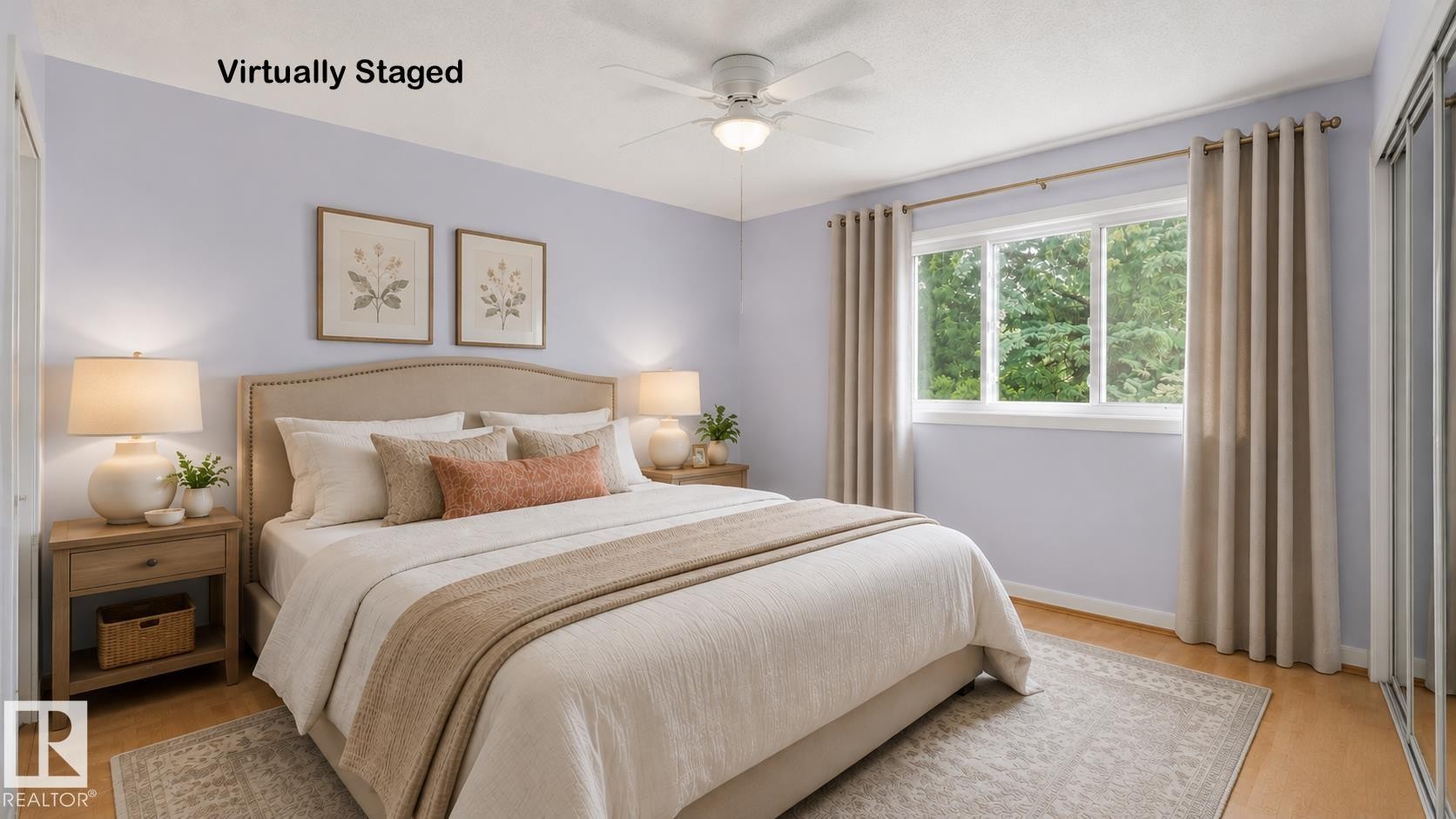 Wood-finish flooring with a ceiling fan, window with exterior landscape, and mirrored sliding closet doors - 8408 176 Street Nw, Edmonton, AB - Indoor Photo Showing Bedroom