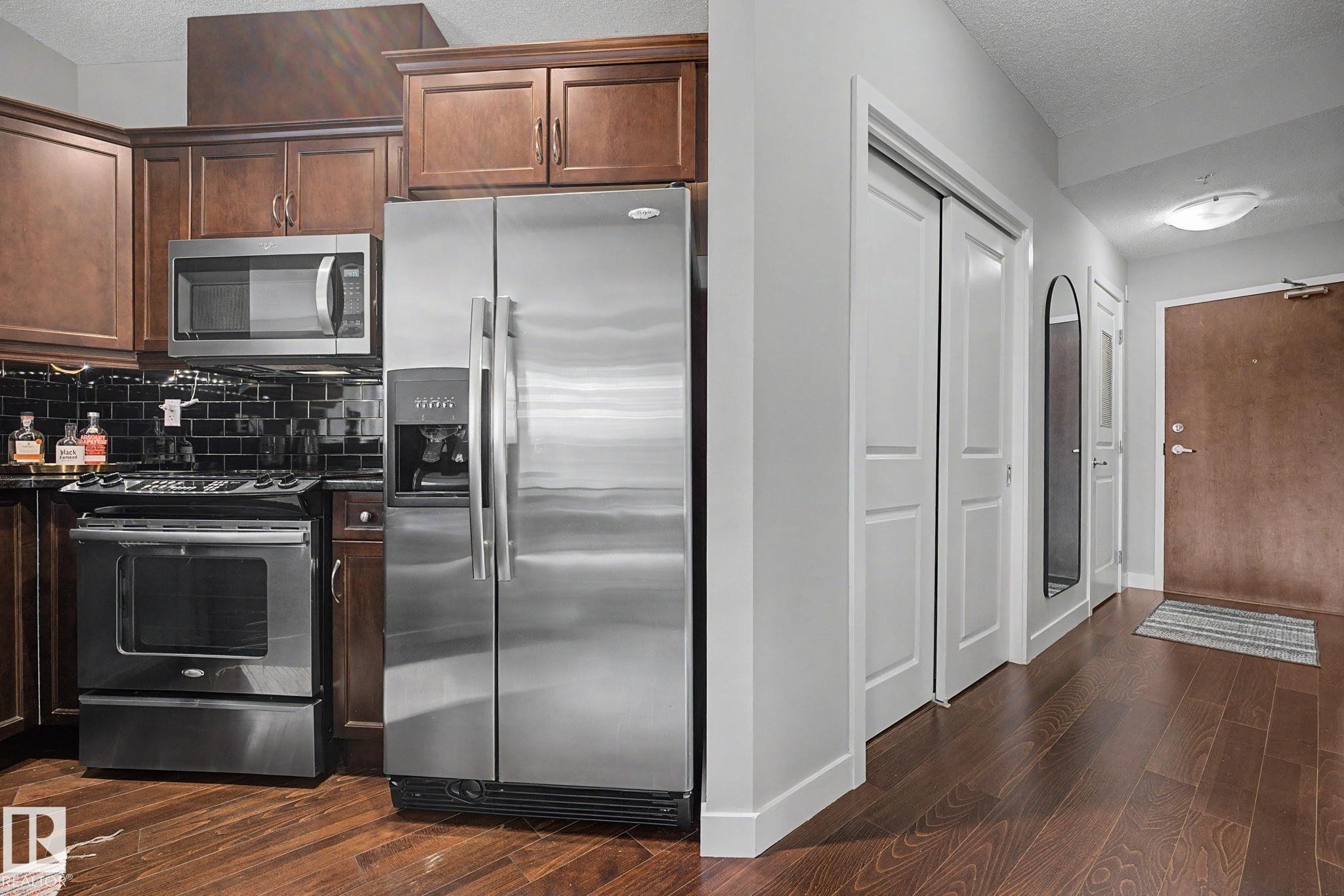 #307 7907 109 St Nw, Edmonton, AB - Indoor Photo Showing Kitchen With Stainless Steel Kitchen