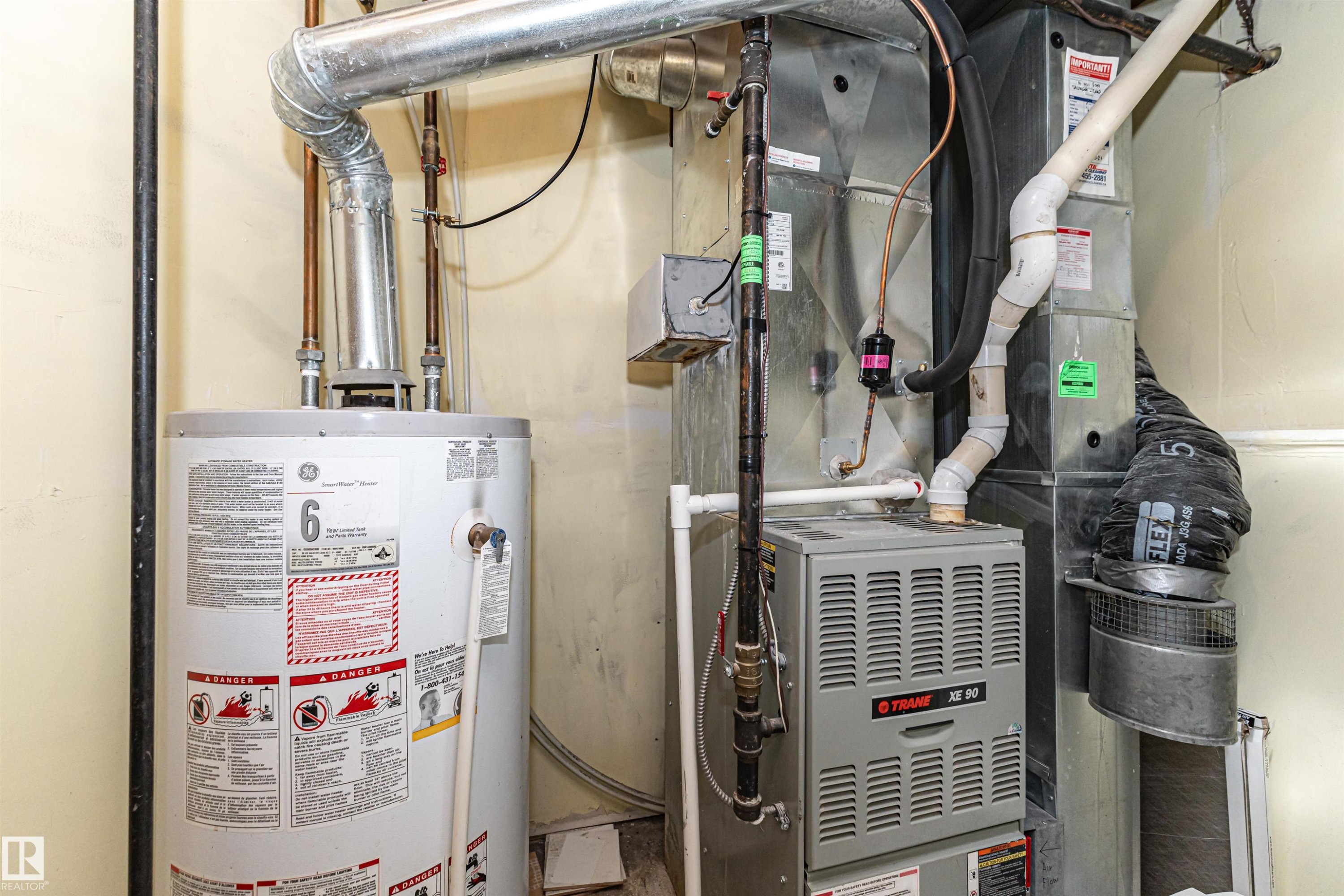 Water heater and furnace systems - 12241 93 Street Nw, Edmonton, AB - Indoor Photo Showing Basement