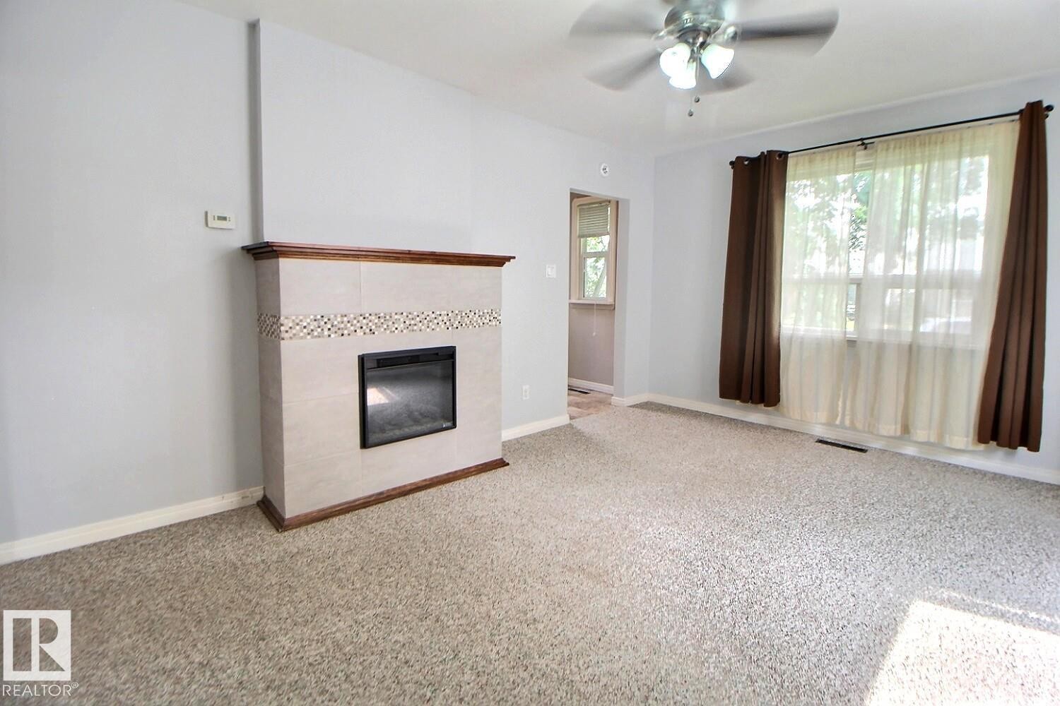 11626 87 Street Nw, Edmonton, AB - Indoor With Fireplace