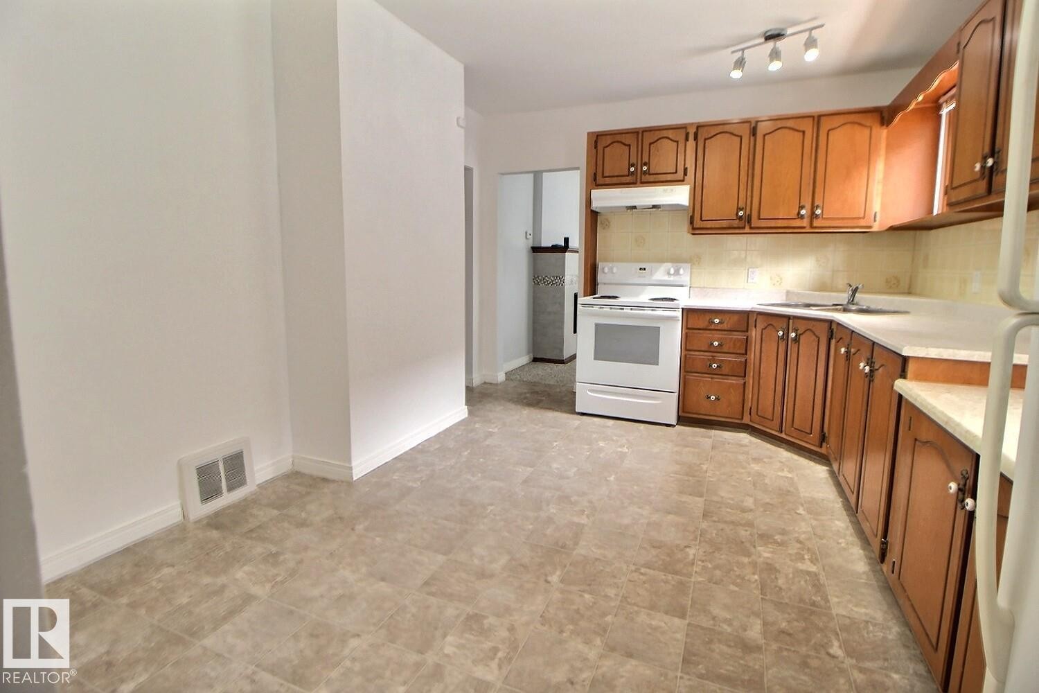 11626 87 Street Nw, Edmonton, AB - Indoor Photo Showing Kitchen With Double Sink