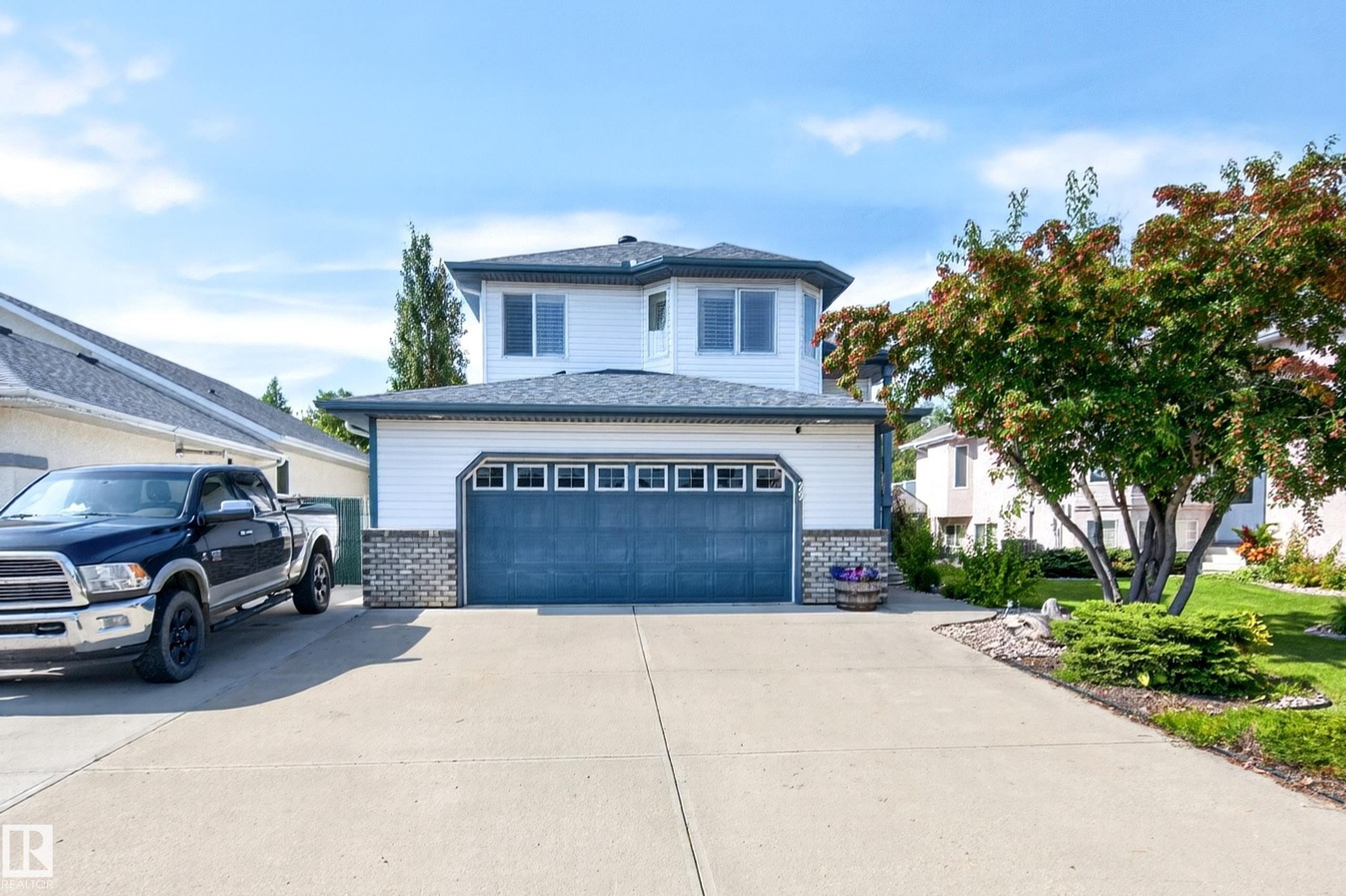 Oversized heated garage and extended driveway for RV or trailer! - 29 Second Avenue, Ardrossan, AB - Outdoor