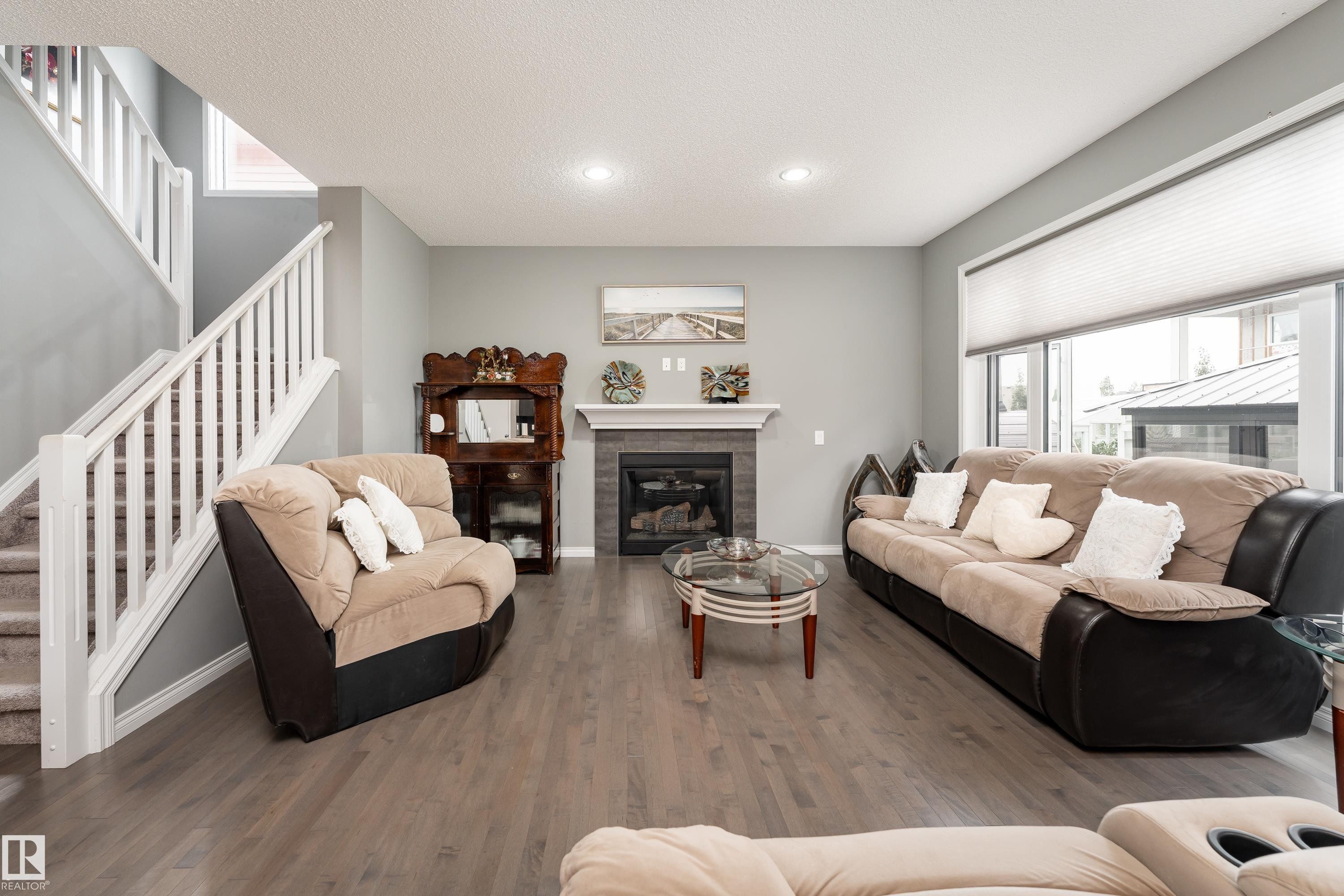 2055 Redtail Common Nw, Edmonton, AB - Indoor Photo Showing Living Room With Fireplace