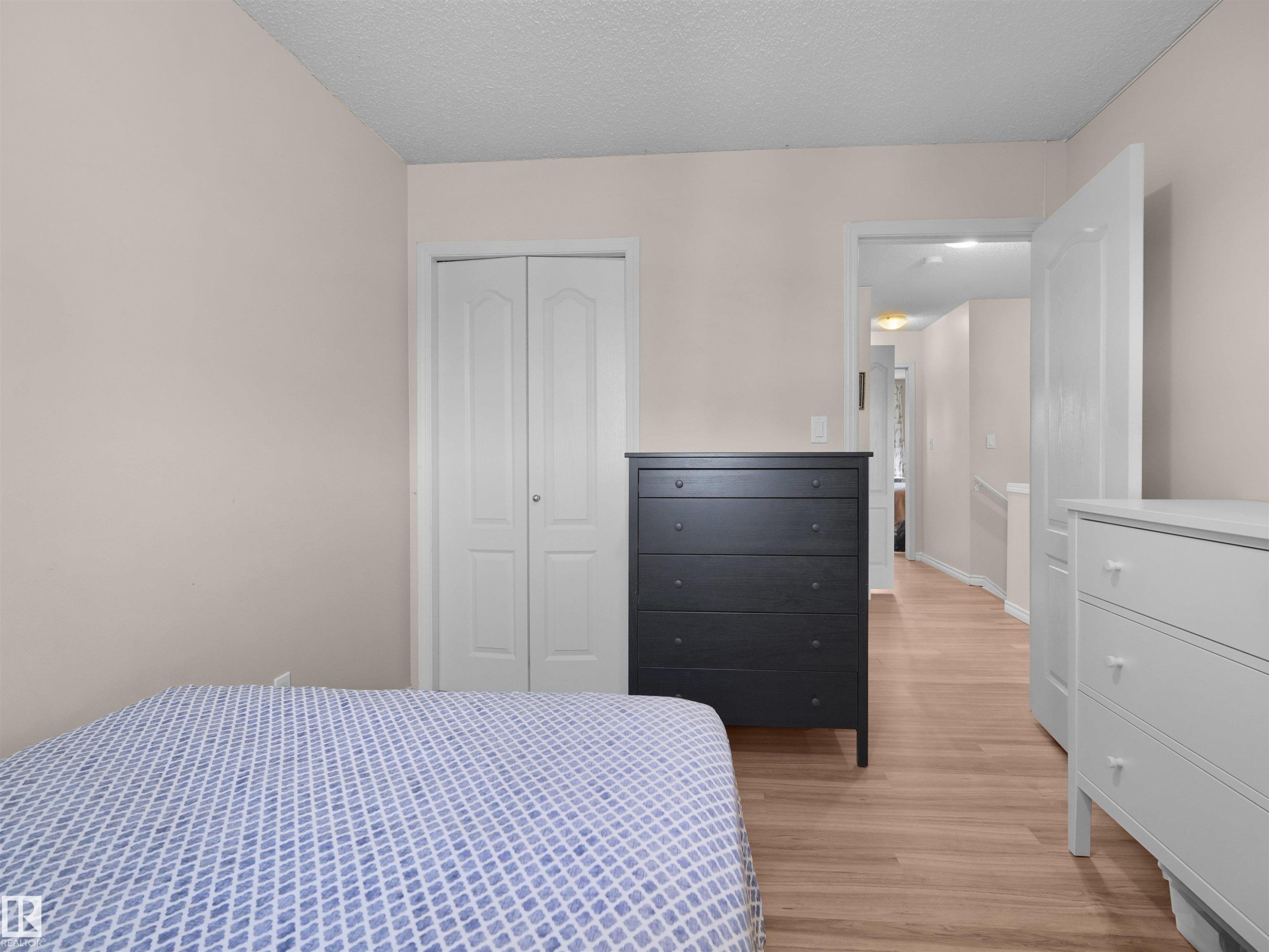 #90 5001 62 St, Beaumont, AB - Indoor Photo Showing Bedroom
