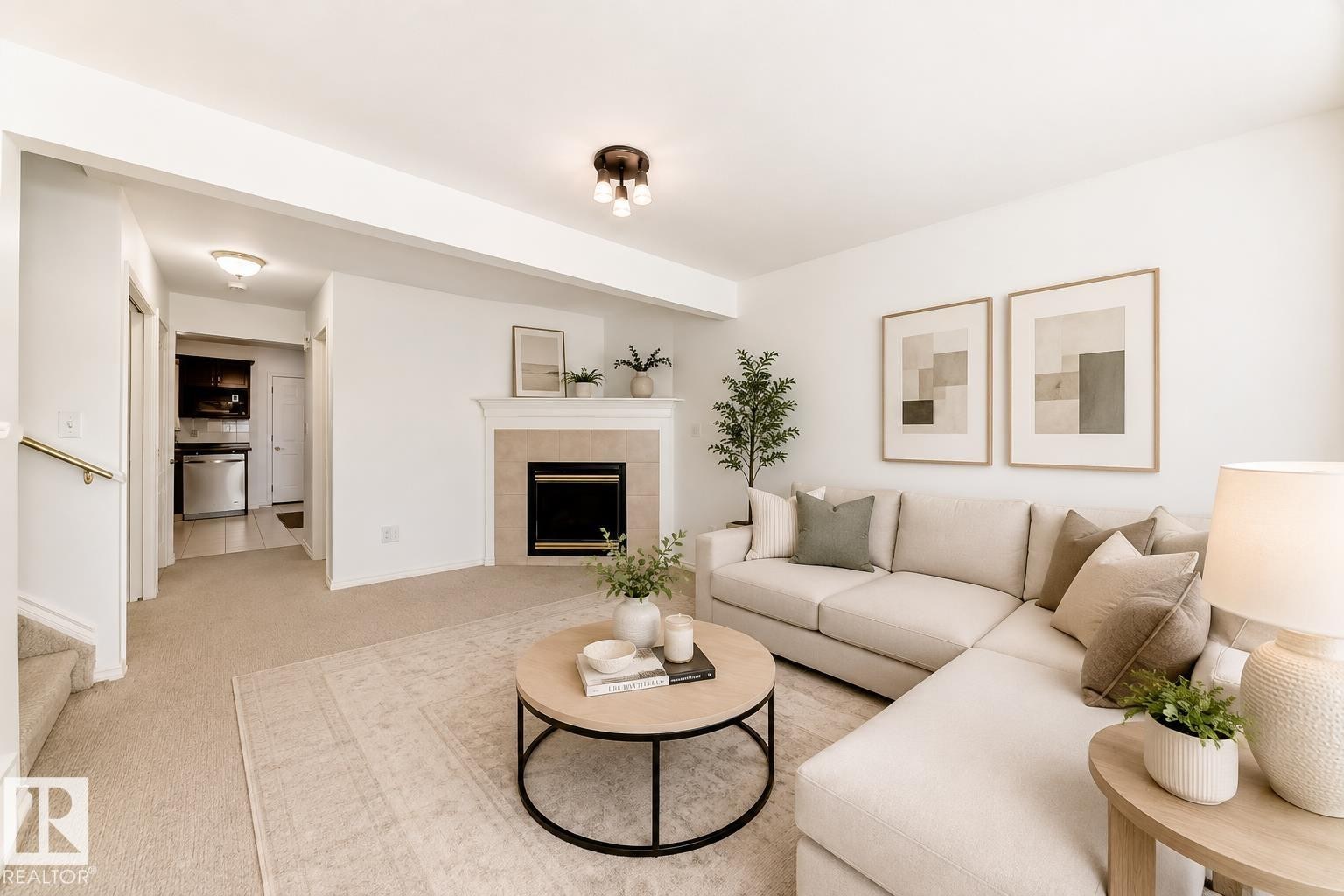 Living area featuring a fireplace with a tiled surround, recessed lighting, and carpeting - 11727 83 Street Nw, Edmonton, AB - Indoor Photo Showing Living Room With Fireplace