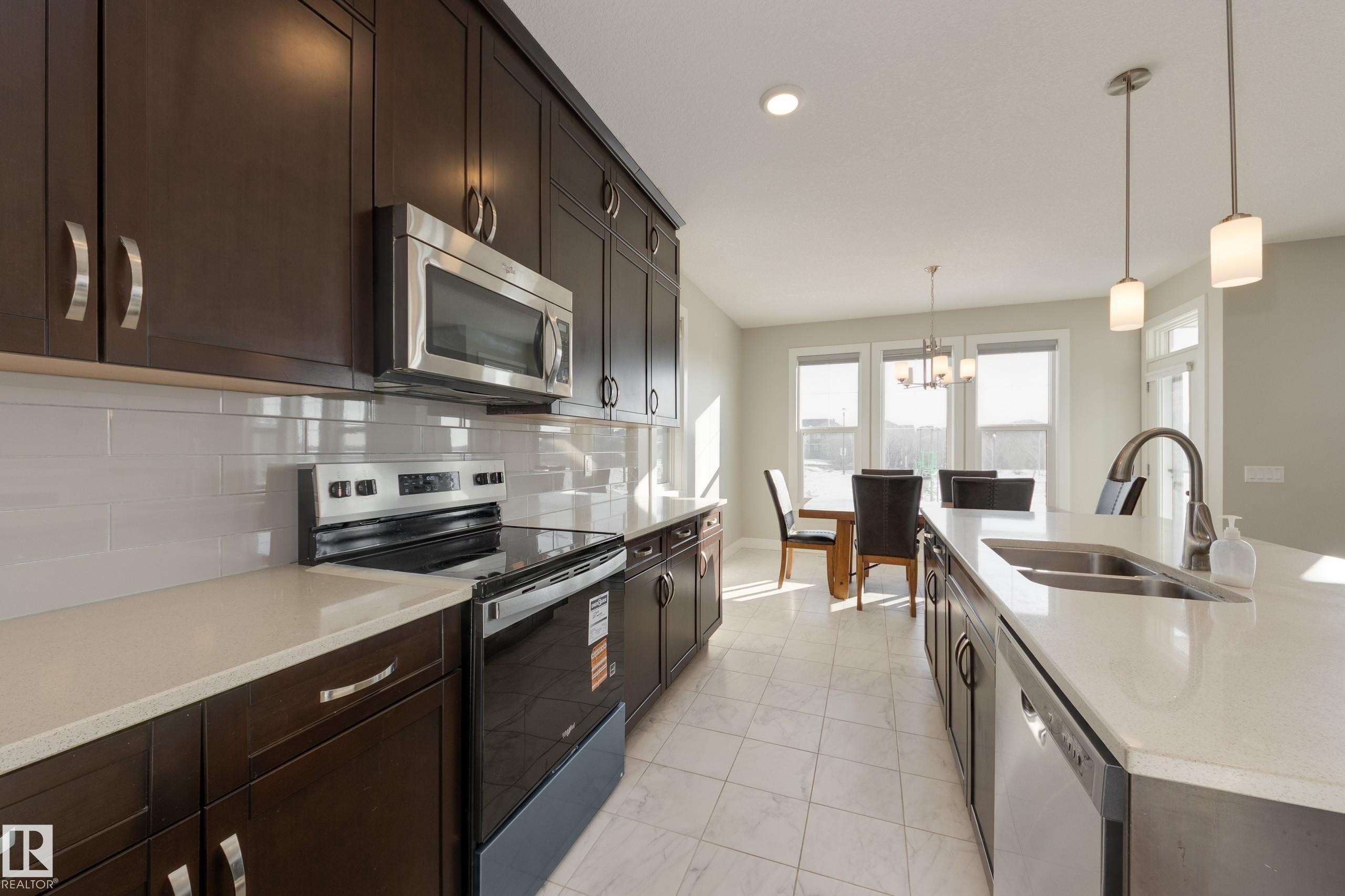7473 Colonel Mewburn Road Nw, Edmonton, AB - Indoor Photo Showing Kitchen With Double Sink With Upgraded Kitchen