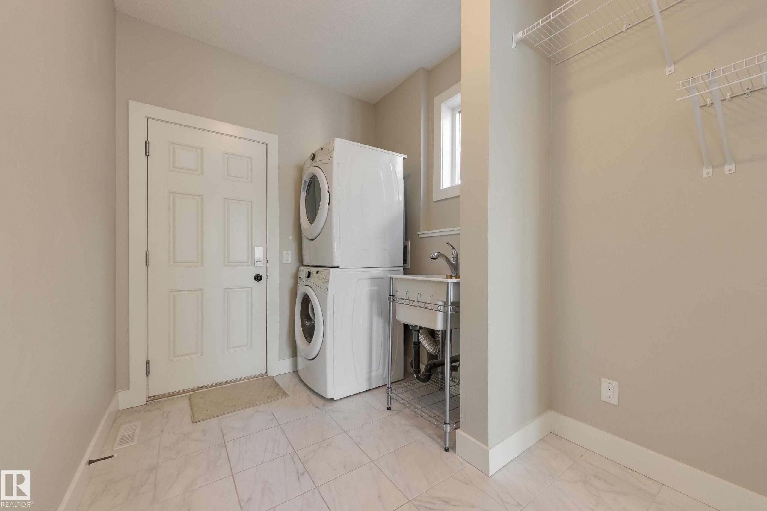7473 Colonel Mewburn Road Nw, Edmonton, AB - Indoor Photo Showing Laundry Room