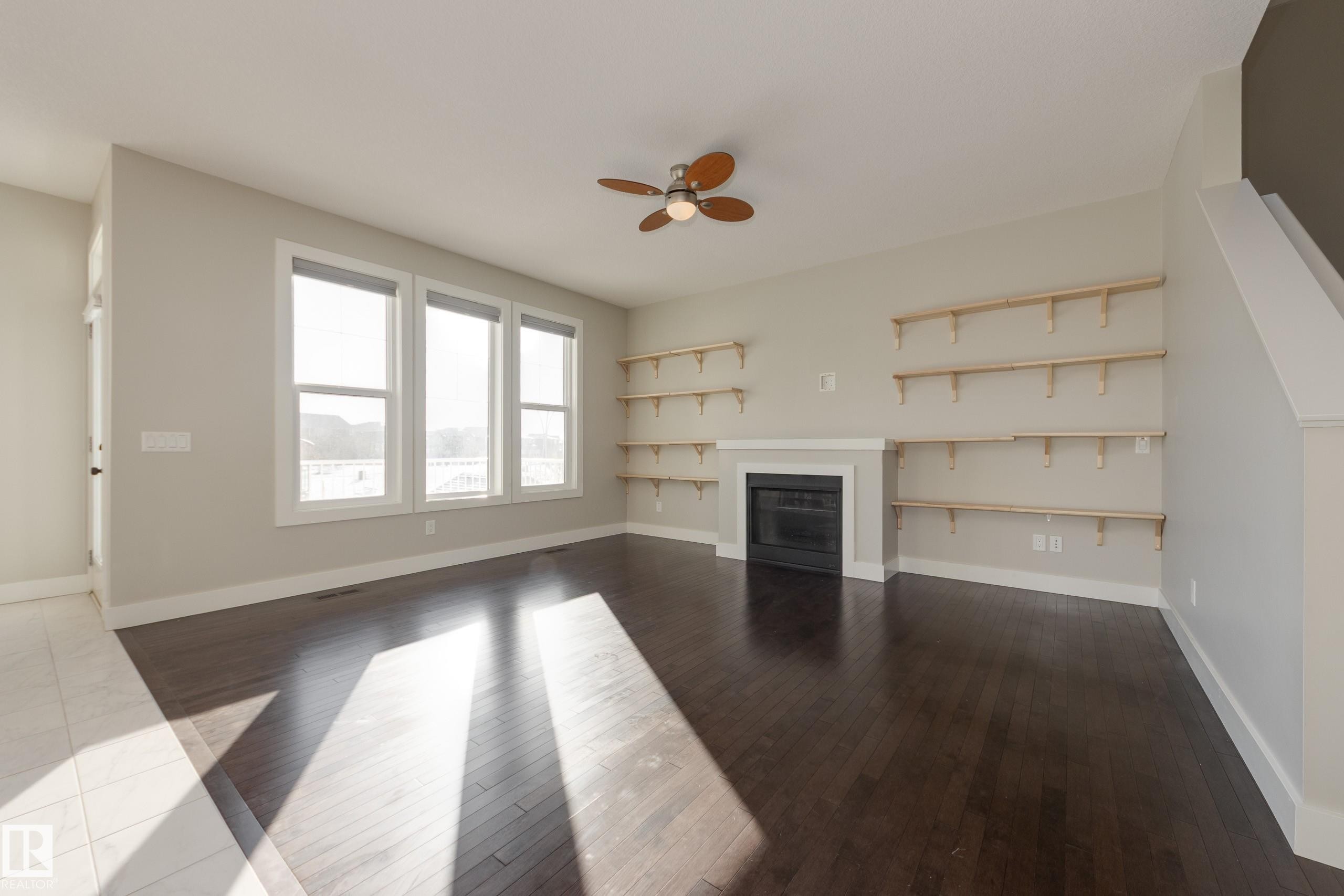 7473 Colonel Mewburn Road Nw, Edmonton, AB - Indoor With Fireplace