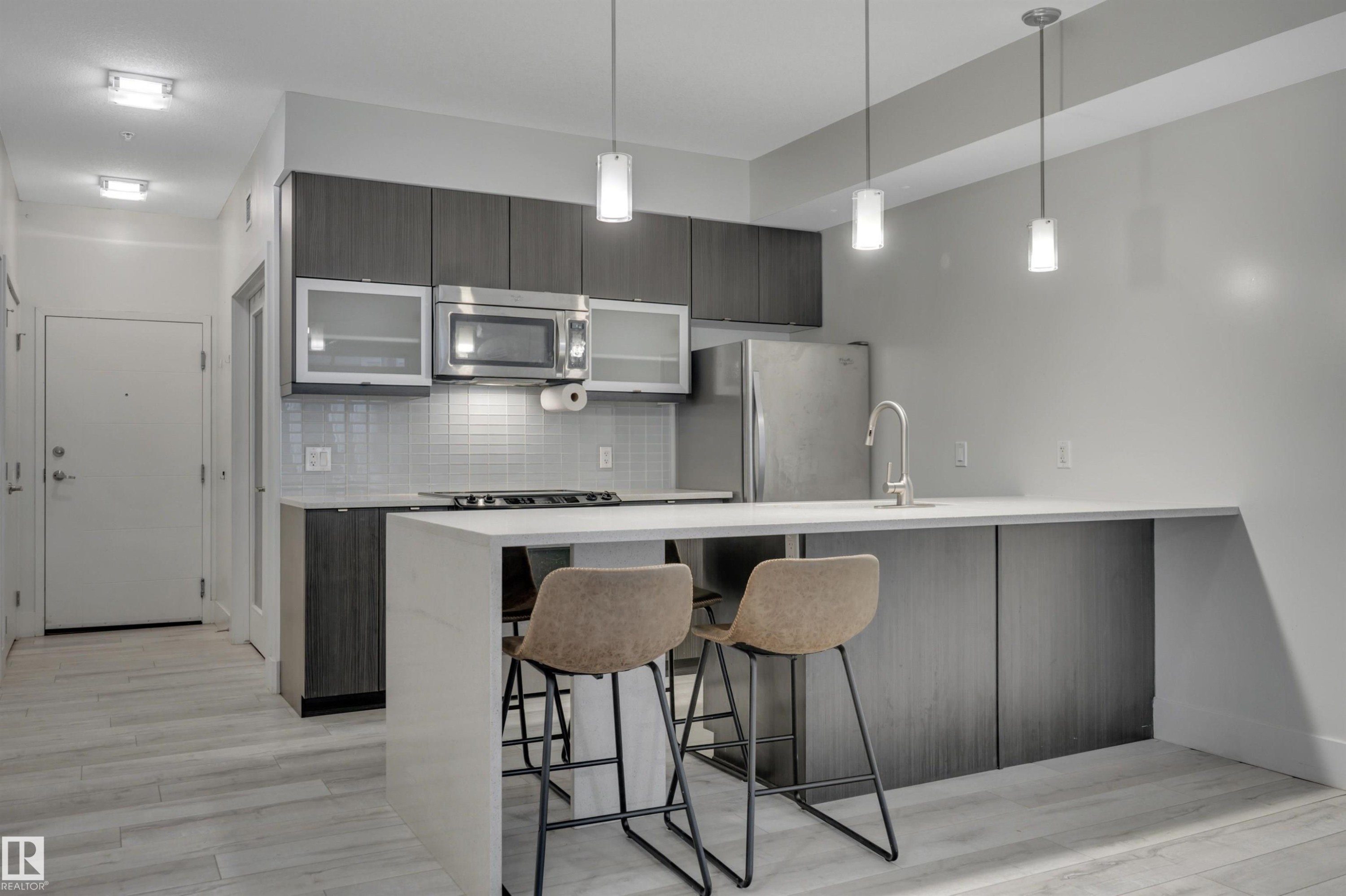 #105 10030 83 Av Nw, Edmonton, AB - Indoor Photo Showing Kitchen With Upgraded Kitchen
