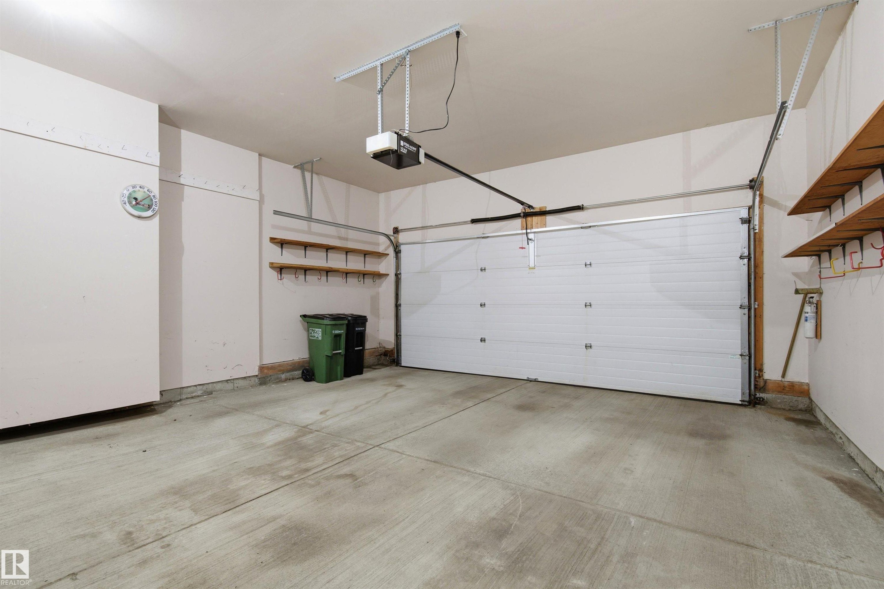 #10 9 Dechene Rd Nw, Edmonton, AB - Indoor Photo Showing Garage