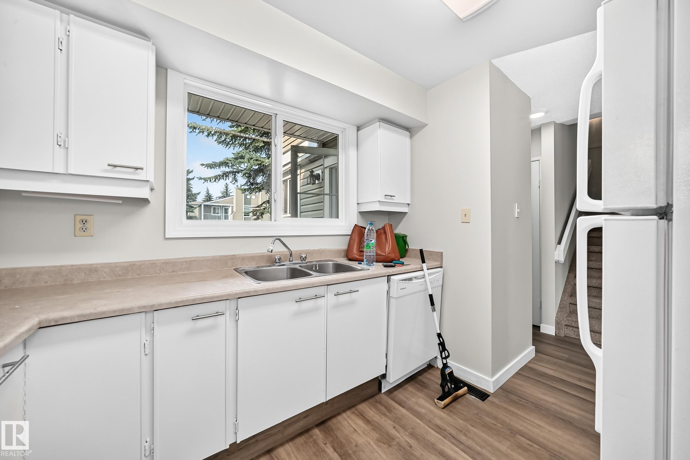 #6 1820 56 St Nw, Edmonton, AB - Indoor Photo Showing Kitchen With Double Sink