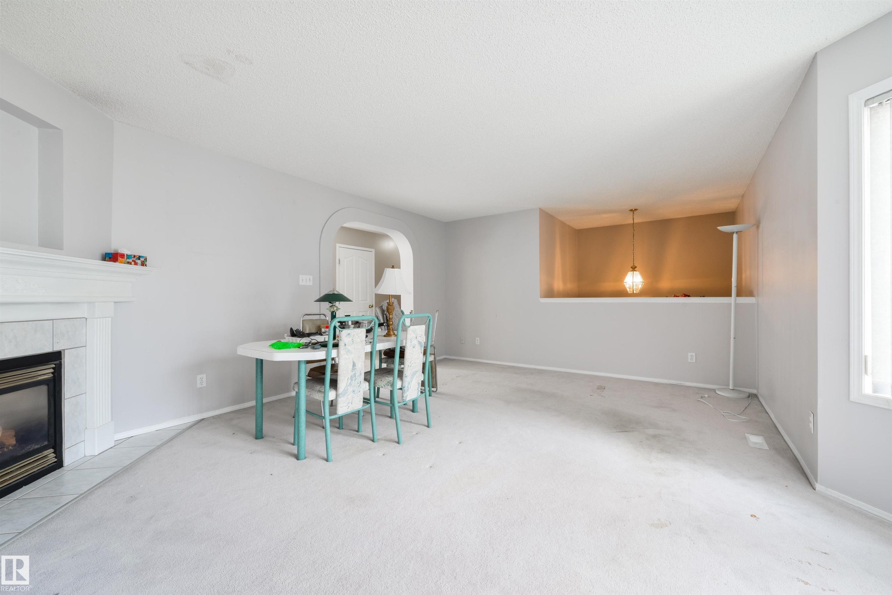 #123 1670 Jamha Rd Nw, Edmonton, AB - Indoor With Fireplace