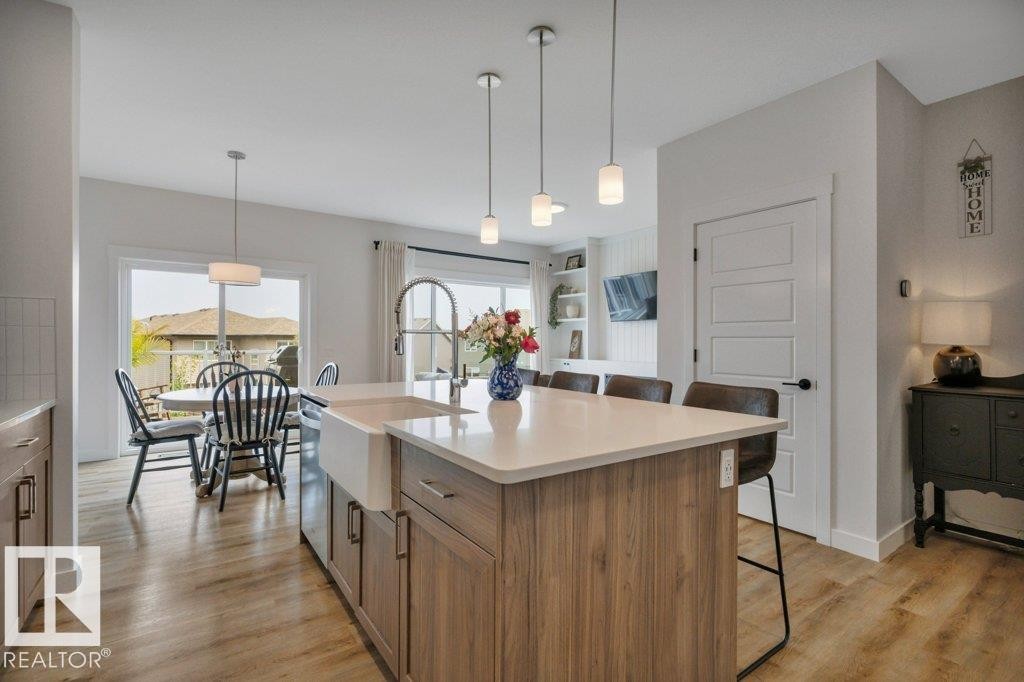 Looking towards dining nook/deck and great room - 5329 Lark Landing Nw, Edmonton, AB - Indoor Photo Showing Kitchen With Upgraded Kitchen