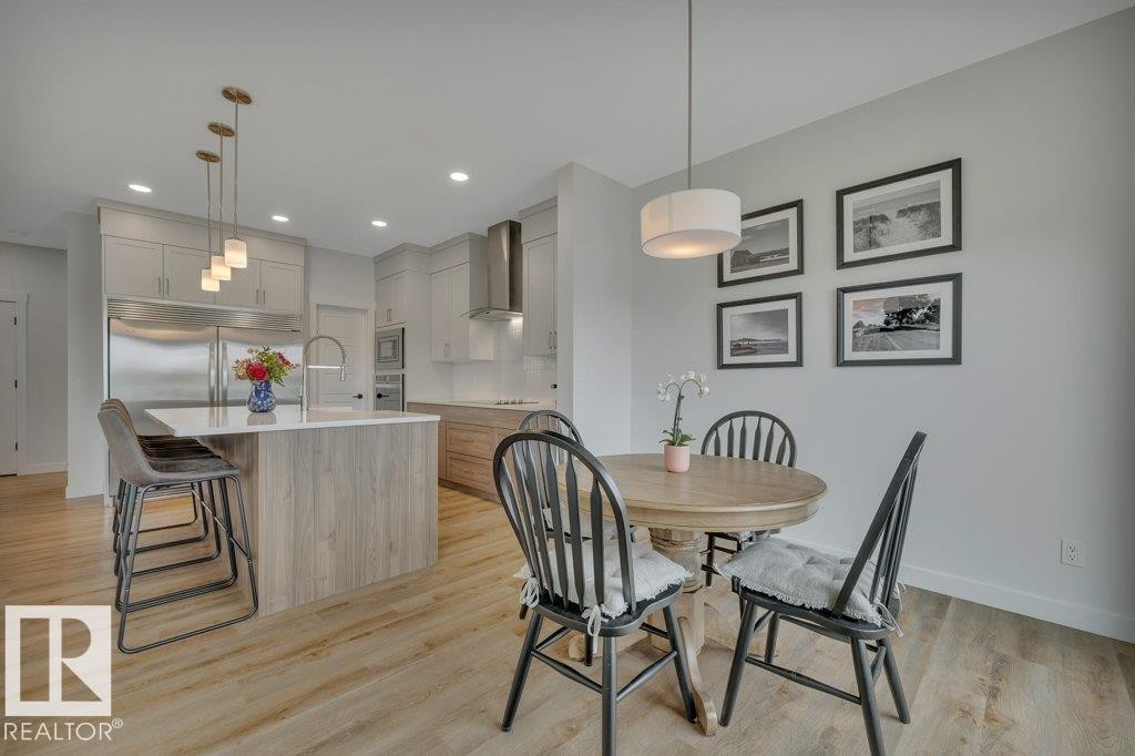 Looking into bright kitchen - 5329 Lark Landing Nw, Edmonton, AB - Indoor Photo Showing Dining Room