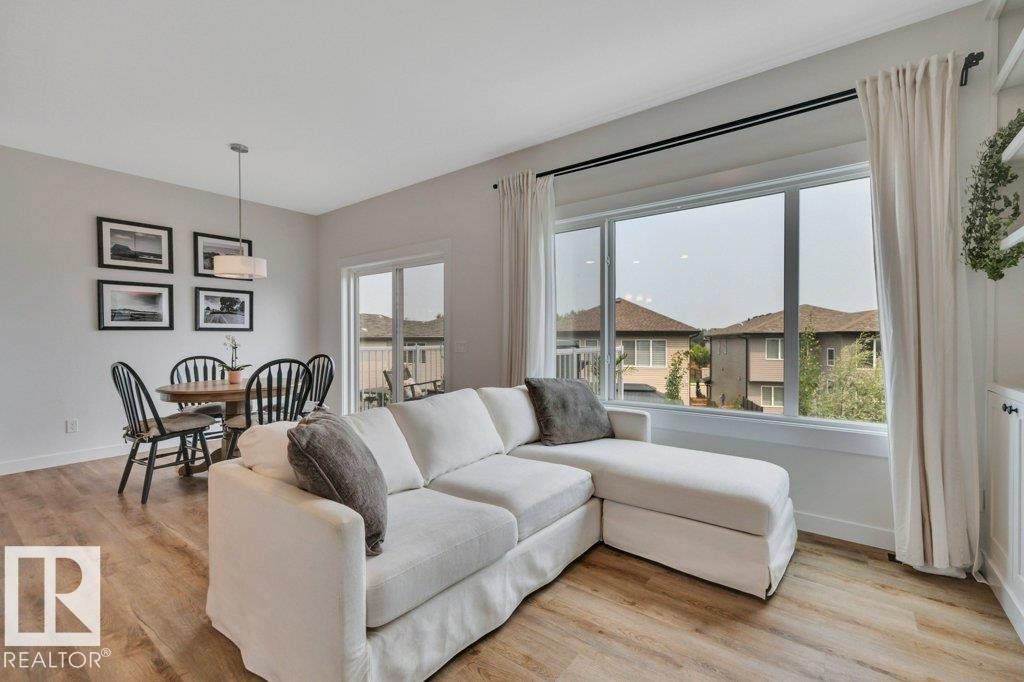 Overlooking bright dining nook - 5329 Lark Landing Nw, Edmonton, AB - Indoor Photo Showing Living Room