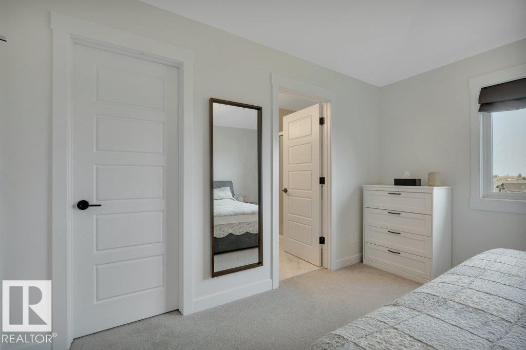 Looking to Primary Ensuite and WIC - 5329 Lark Landing Nw, Edmonton, AB - Indoor Photo Showing Bedroom