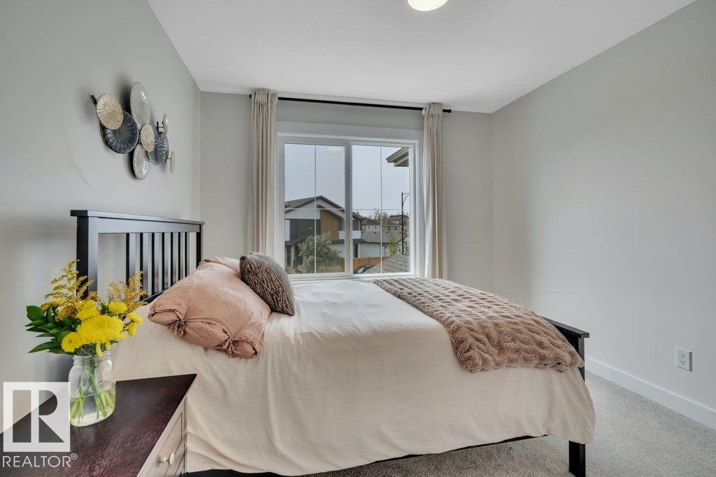Bedroom 3 - 5329 Lark Landing Nw, Edmonton, AB - Indoor Photo Showing Bedroom
