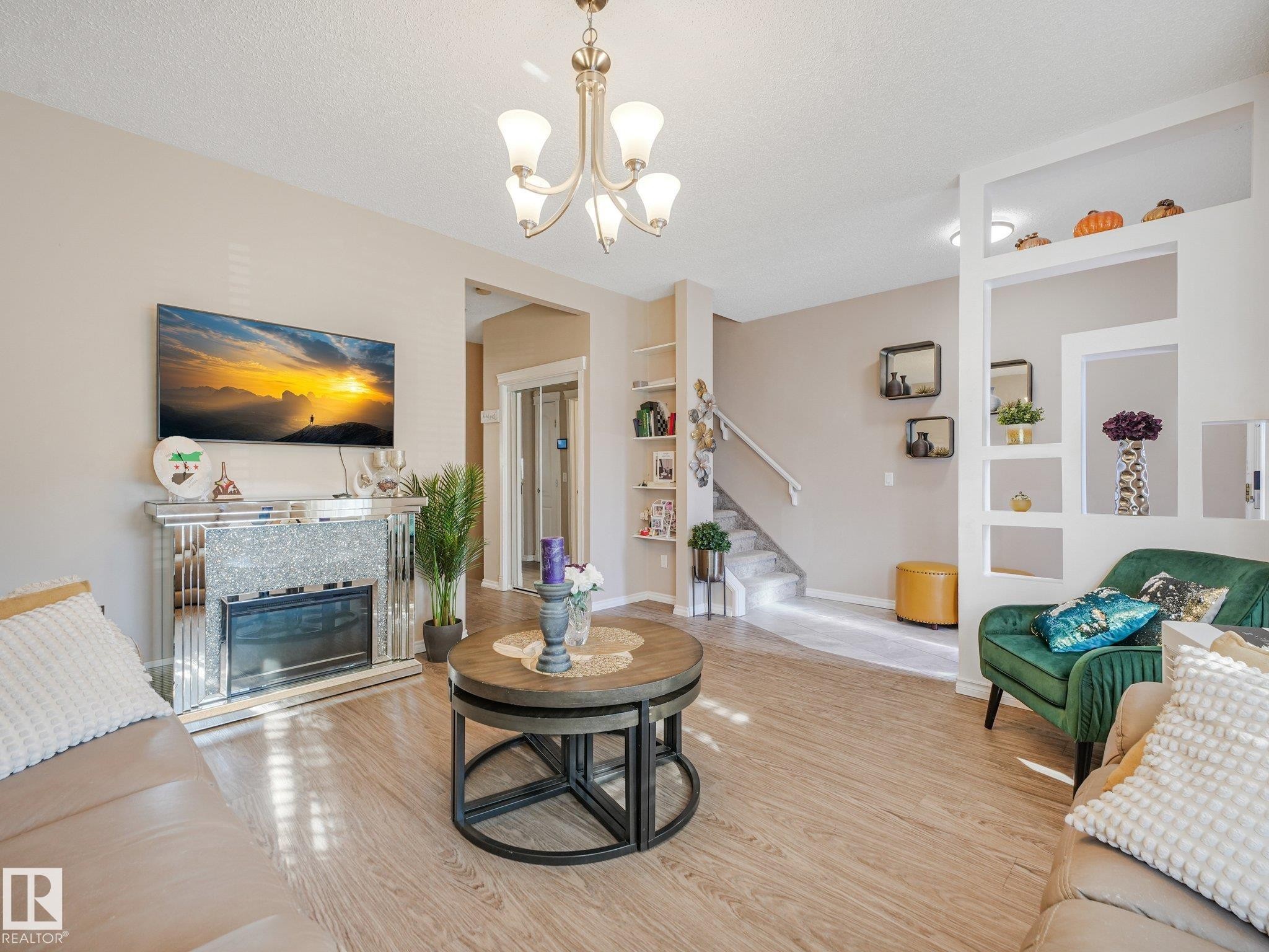 #48 1780 Glastonbury Bv Nw, Edmonton, AB - Indoor Photo Showing Living Room With Fireplace