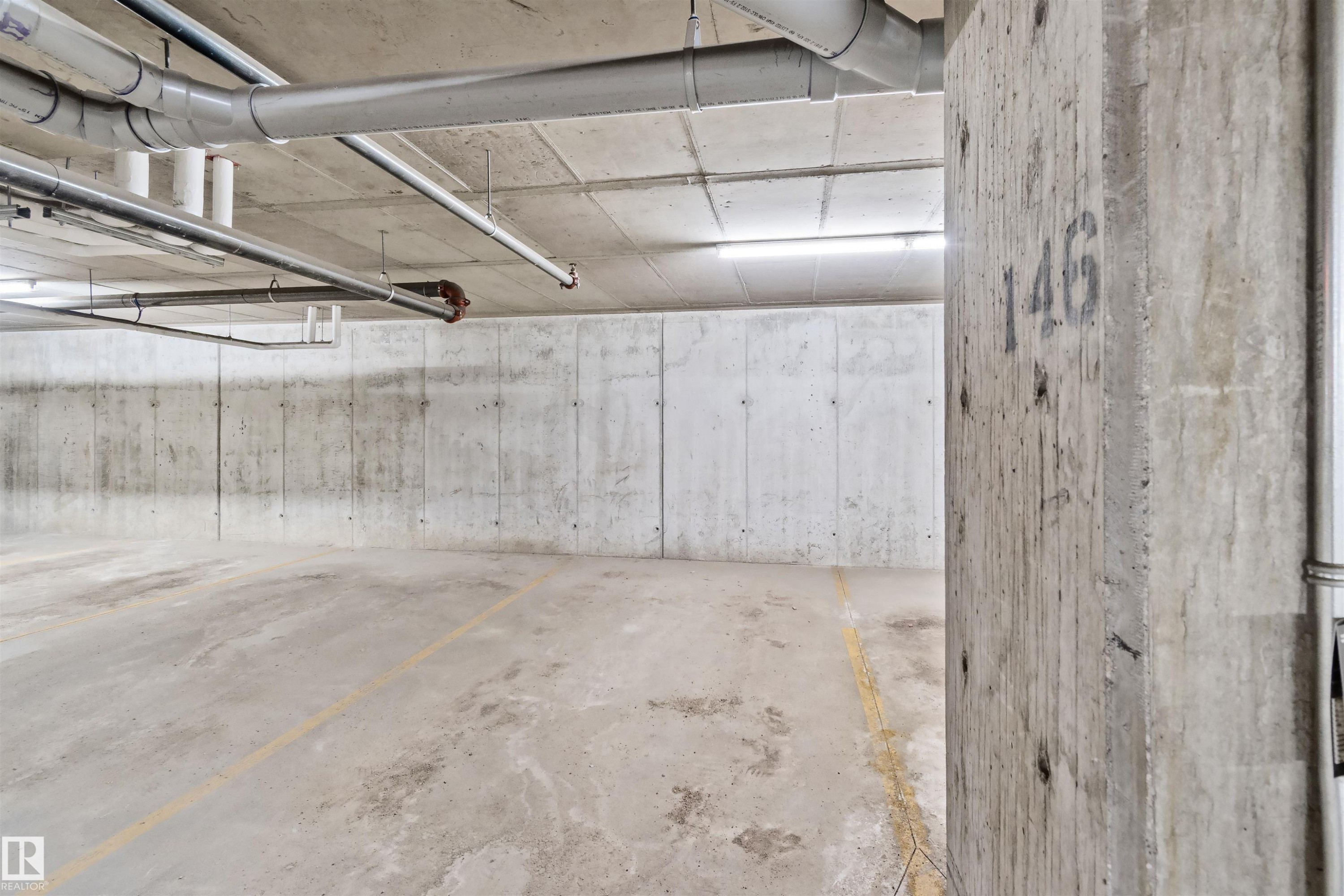 Underground parking stall #2 - #318 5521 7 Av Sw Sw, Edmonton, AB - Indoor Photo Showing Garage