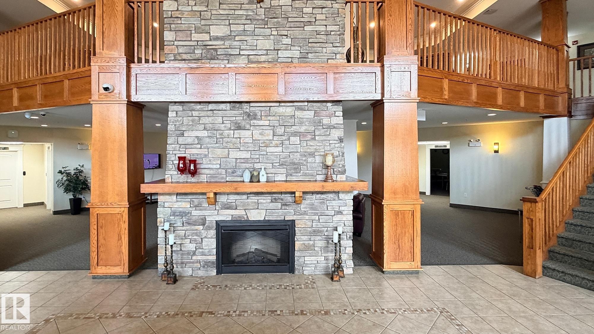 #313 511 Queen St, Spruce Grove, AB - Indoor With Fireplace