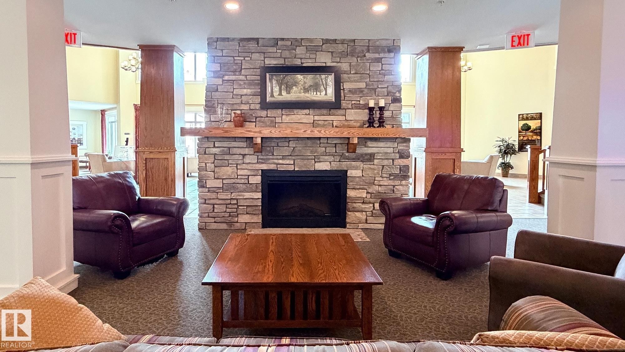#313 511 Queen St, Spruce Grove, AB - Indoor Photo Showing Living Room With Fireplace