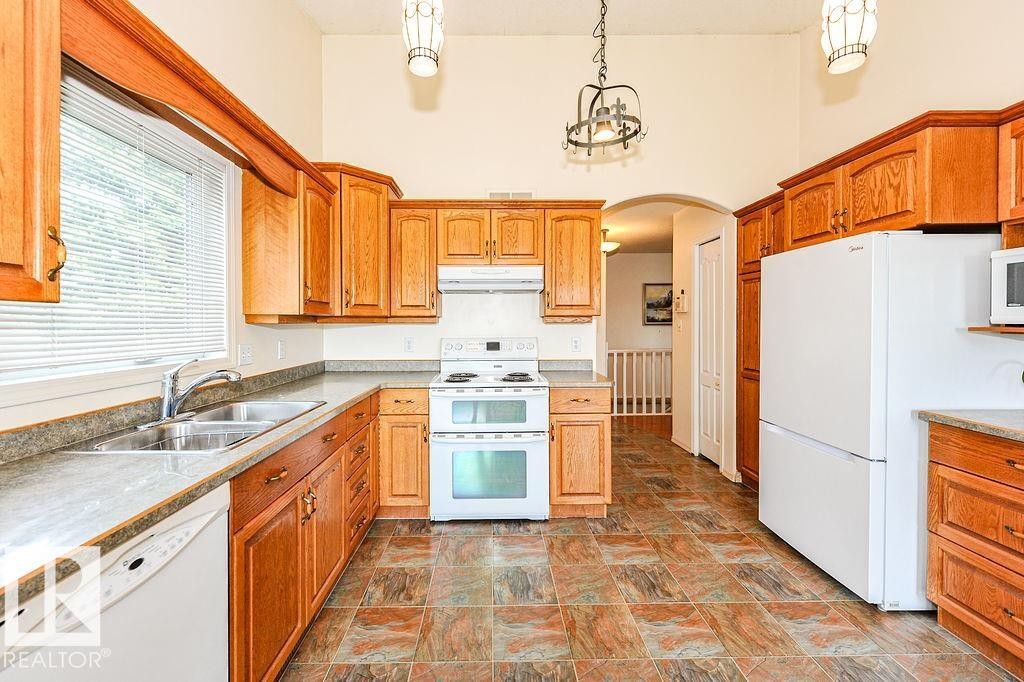 4720 51 Street, Camrose, AB - Indoor Photo Showing Kitchen With Double Sink