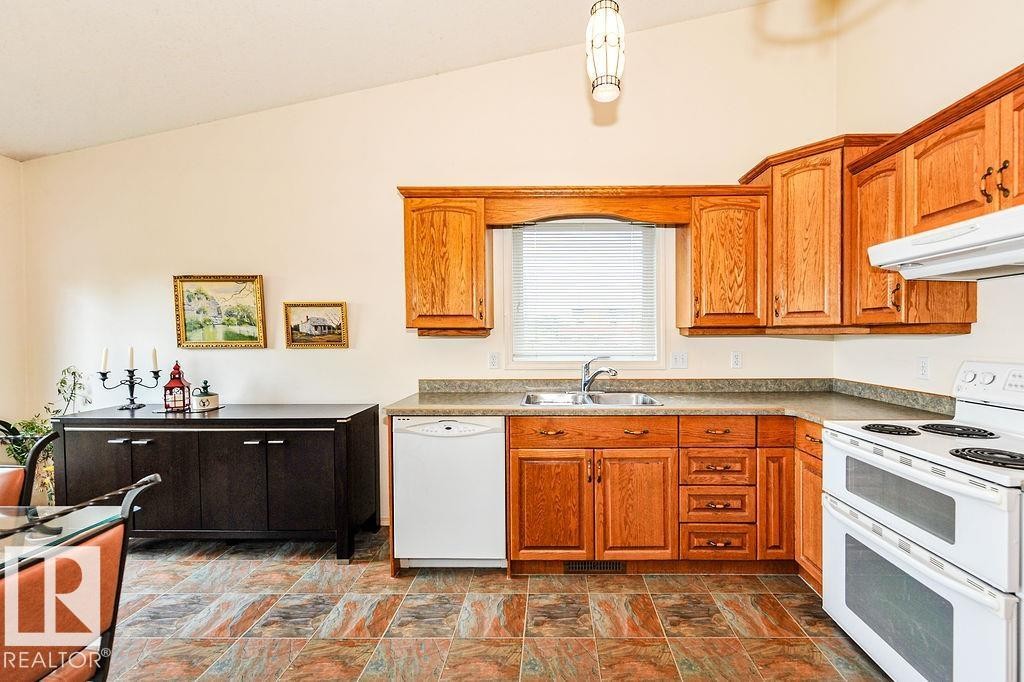 4720 51 Street, Camrose, AB - Indoor Photo Showing Kitchen With Double Sink
