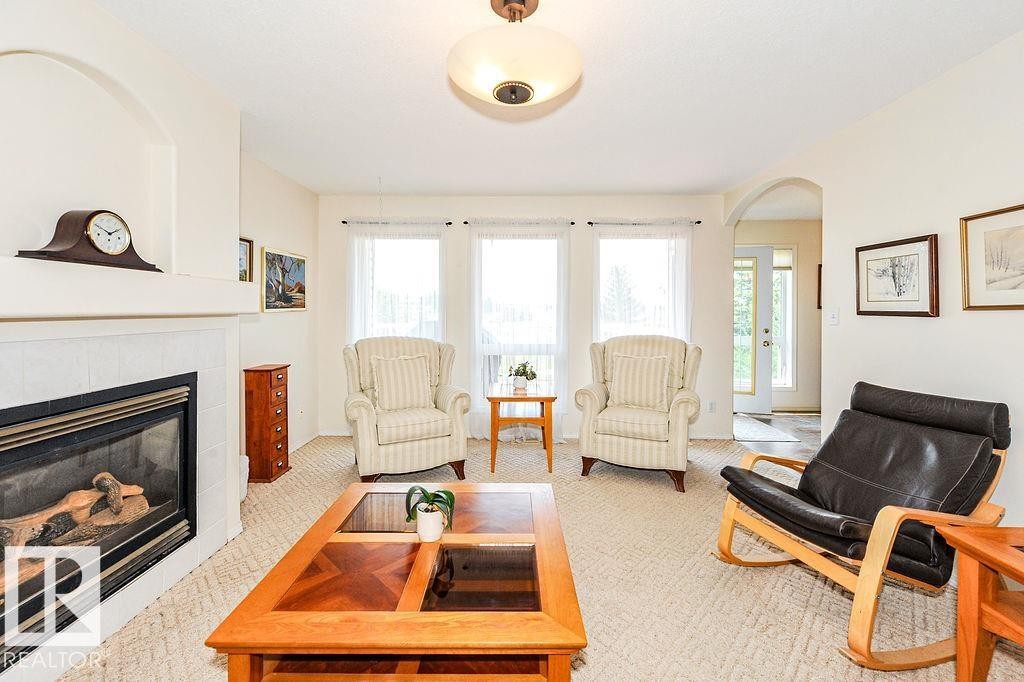 4720 51 Street, Camrose, AB - Indoor Photo Showing Living Room With Fireplace