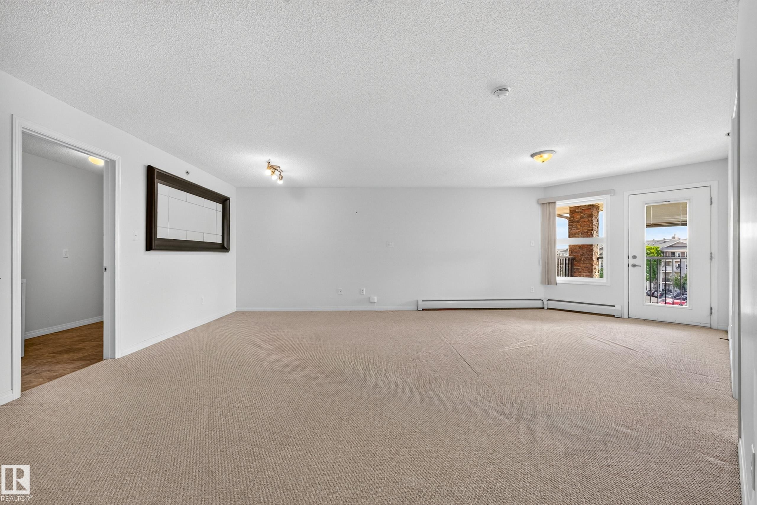 Neutral-toned carpeting throughout - #6430 7331 South Terwillegar Dr Nw, Edmonton, AB