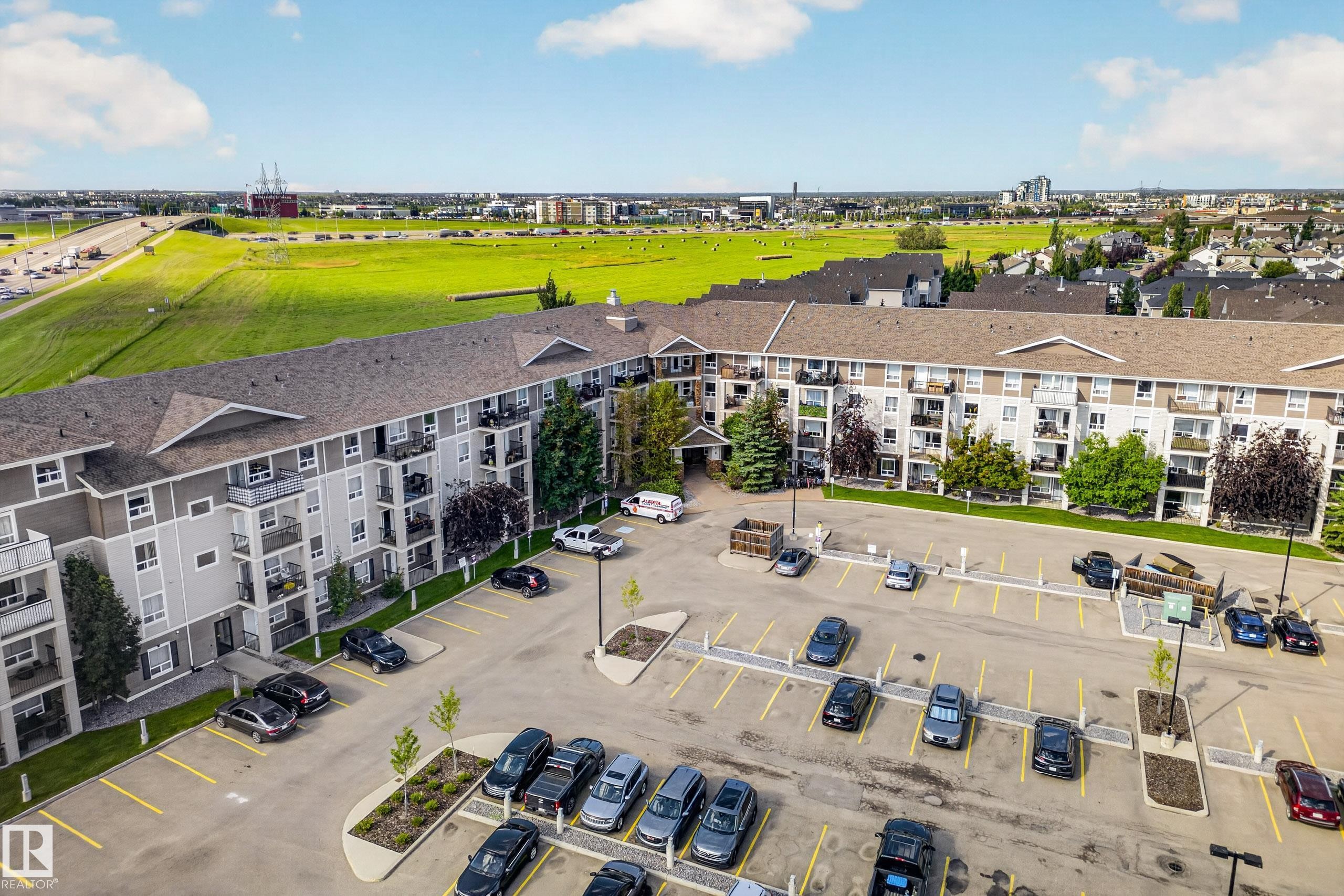 Multi-story residential building with private balconies and exterior parking - #6430 7331 South Terwillegar Dr Nw, Edmonton, AB