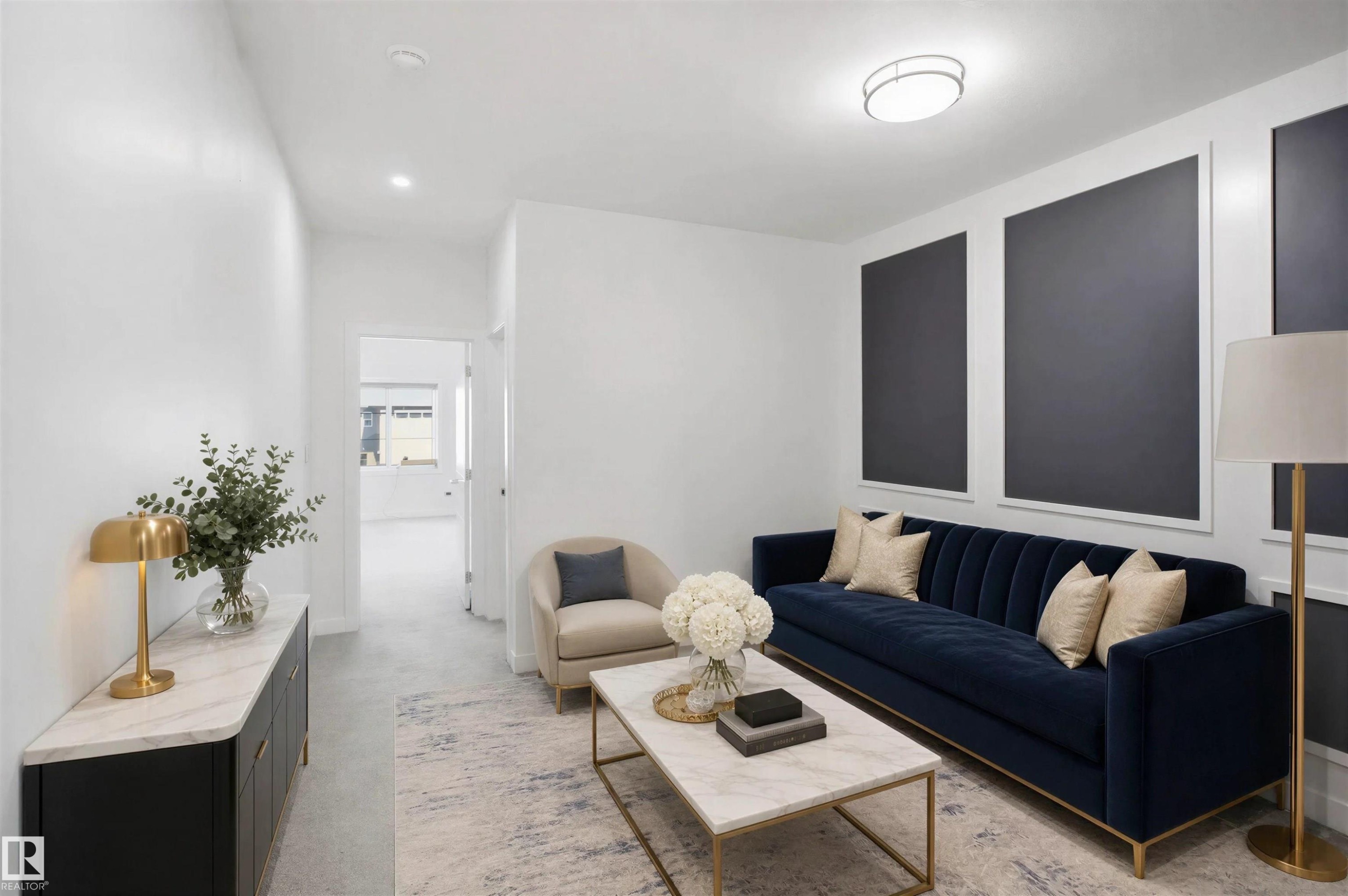 Recessed ceiling lighting, flush mount ceiling fixture, board and batten wall treatment, light tone flooring, white interior walls - 2027 13 Avenue Nw, Edmonton, AB
