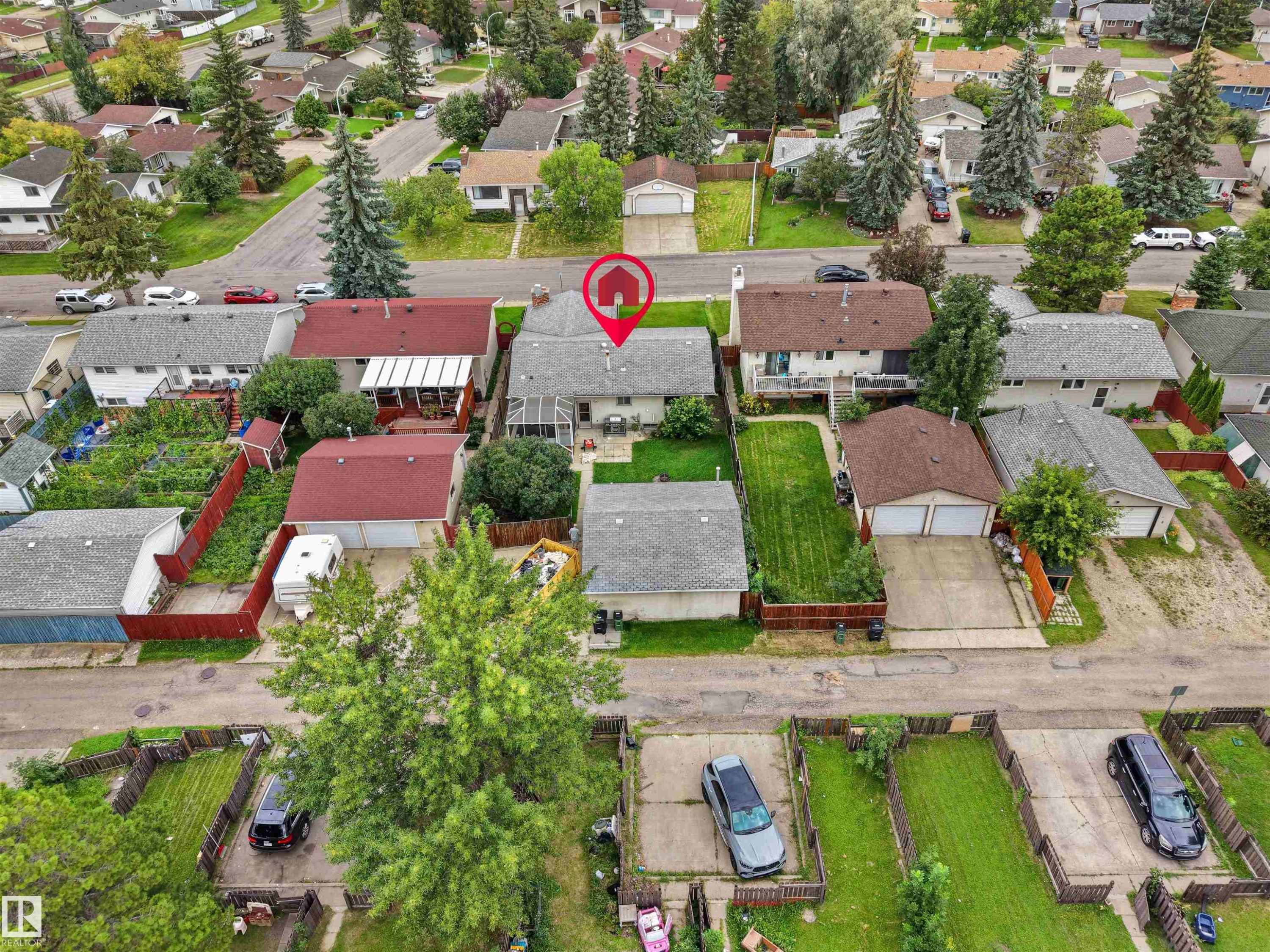 Single-family residence with an attached covered patio and a detached garage structure - 7435 32 Avenue Nw, Edmonton, AB