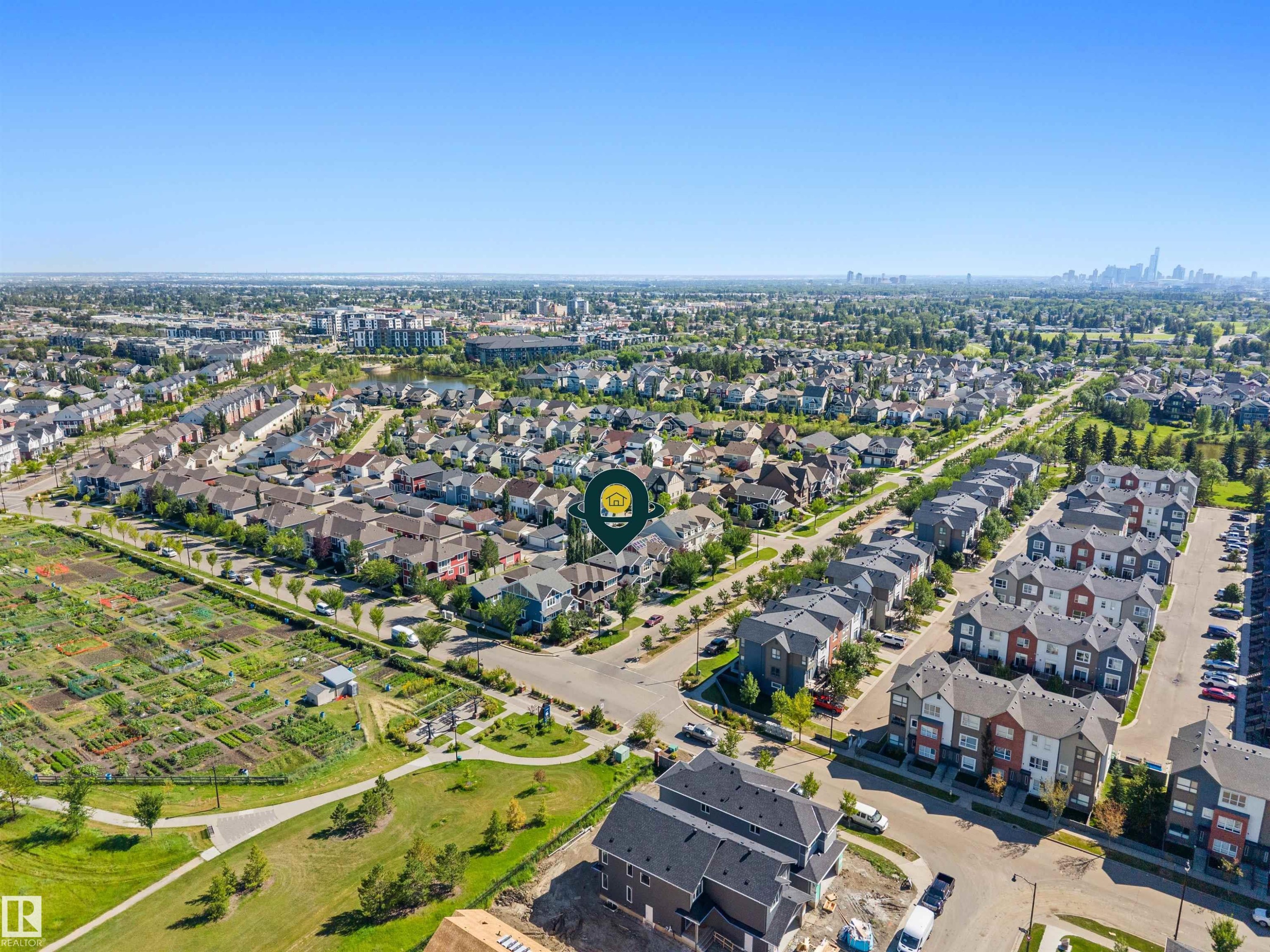 Residential area with varied housing architecture, featuring single-family homes and multi-unit townhouses - 2585 Pegasus Boulevard Nw, Edmonton, AB