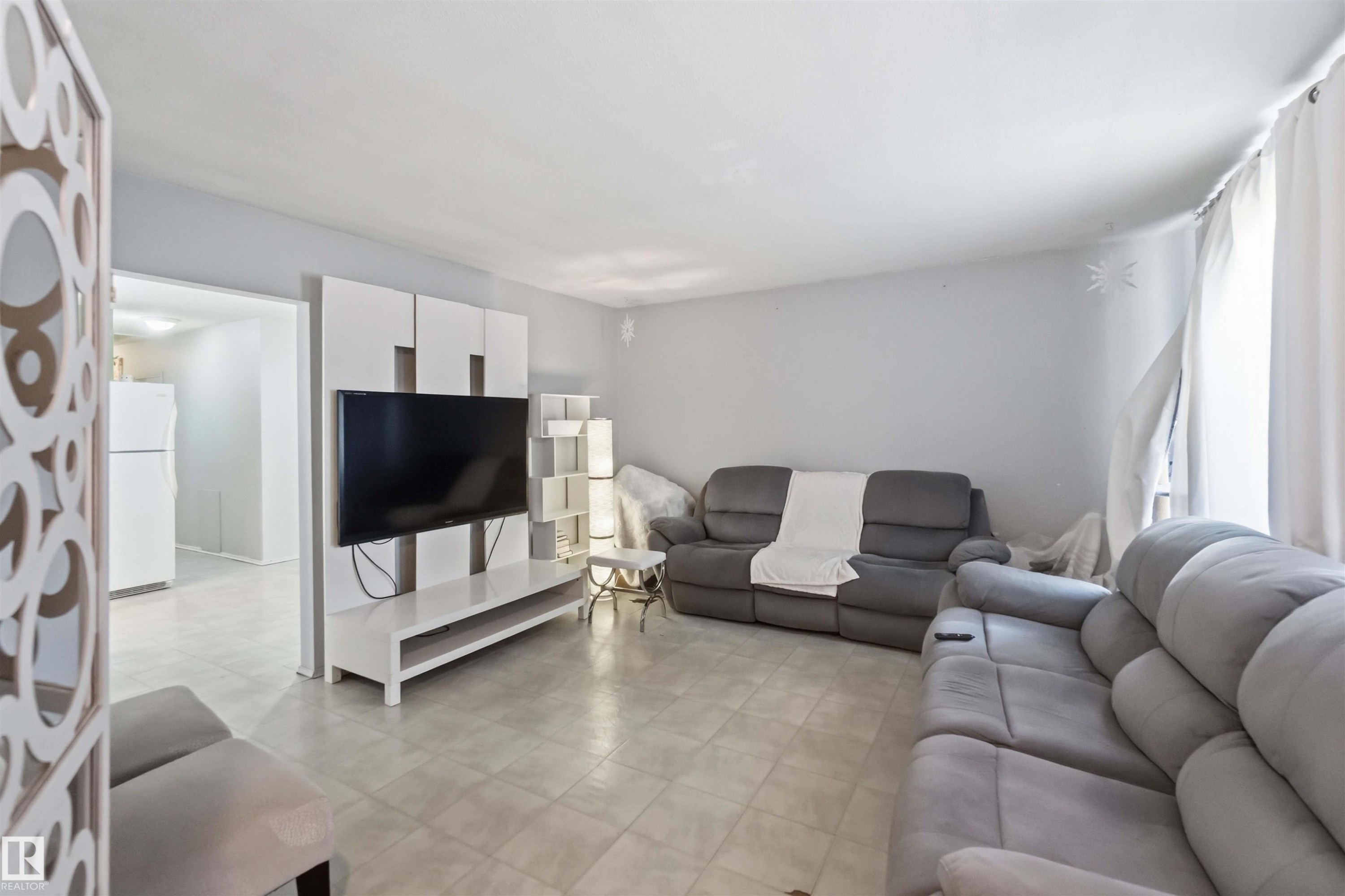 Light gray tile flooring throughout - 13408 67 Street Nw, Edmonton, AB