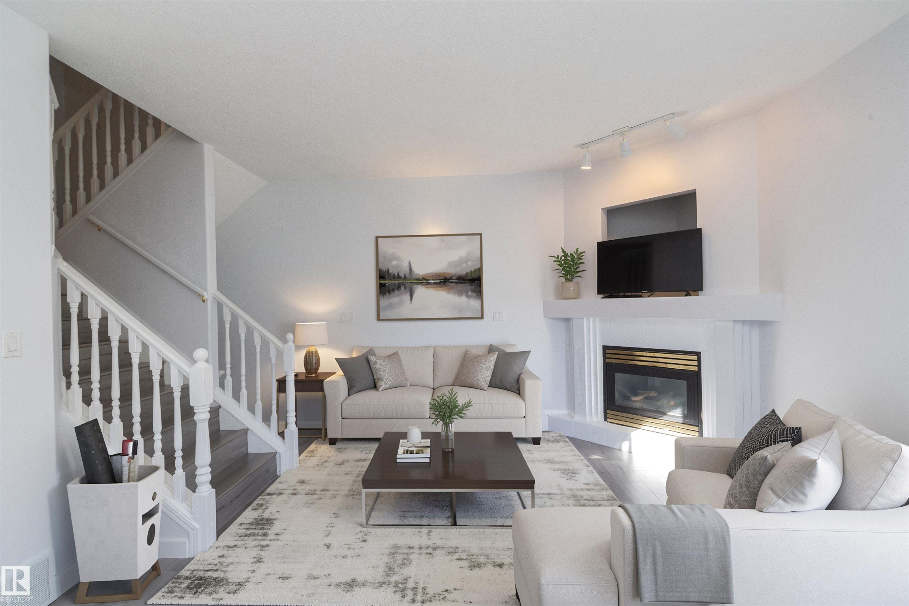 White painted fireplace with a gold-finished insert and mantel - #37 3811 85 St Nw, Edmonton, AB