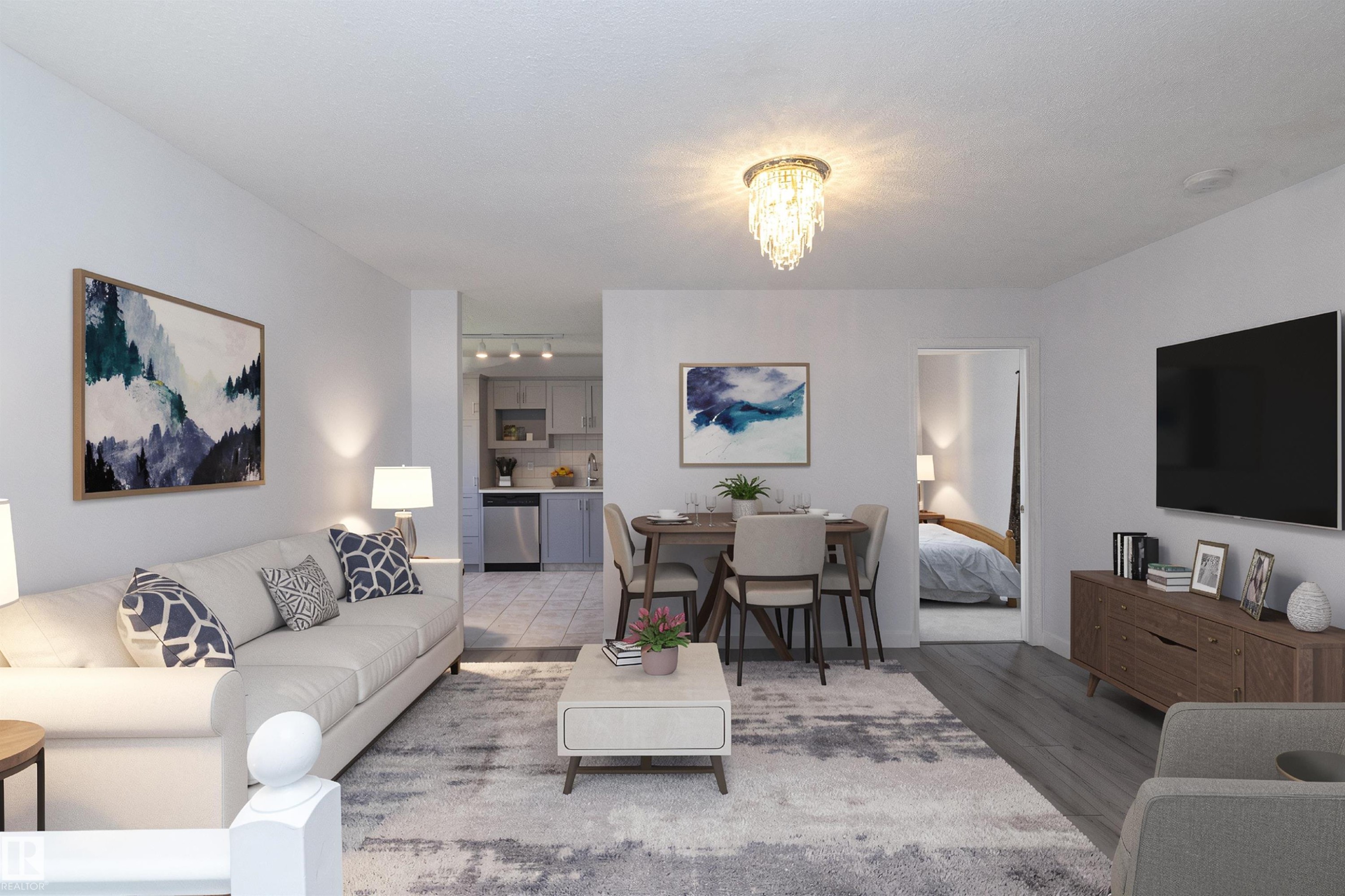 Open-concept living space with wood-finish flooring, a contemporary chandelier, and recessed lighting in the kitchen - #37 3811 85 St Nw, Edmonton, AB