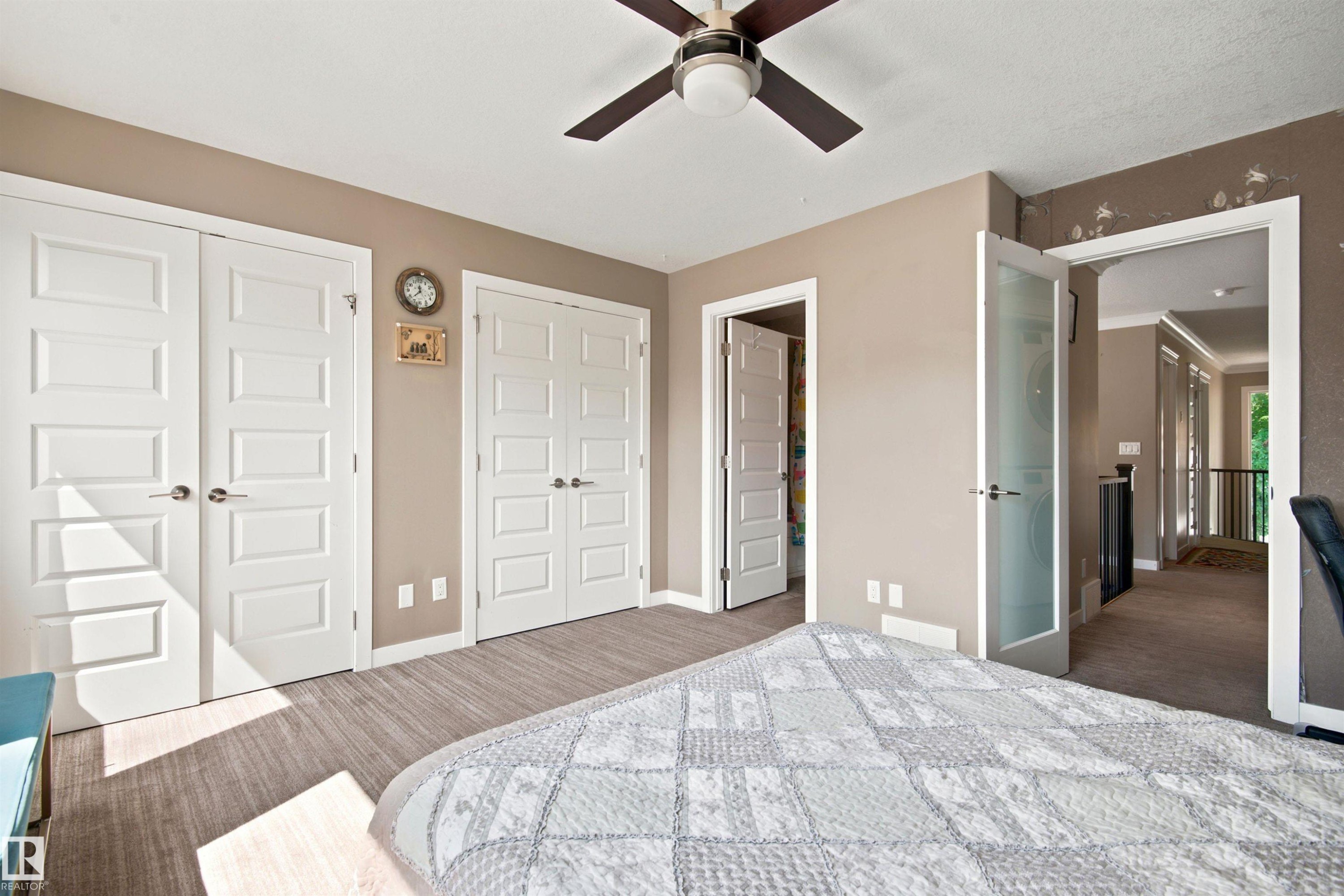 Recessed panel doors, ceiling fan, and frosted glass door - 10833 63 Avenue Nw, Edmonton, AB