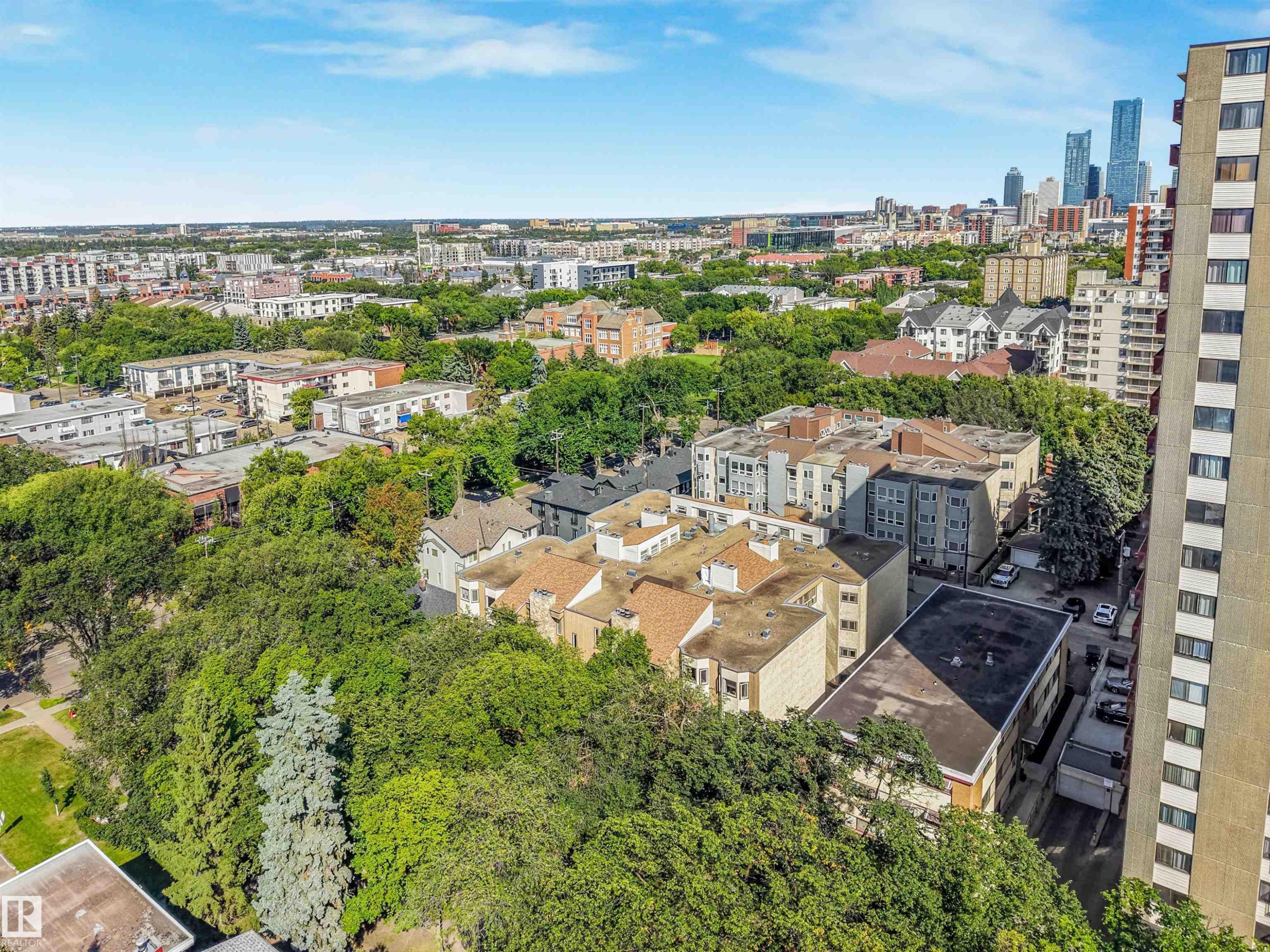 Aerial perspective of the urban landscape featuring a prominent skyline - #203 10171 119 St Nw, Edmonton, AB